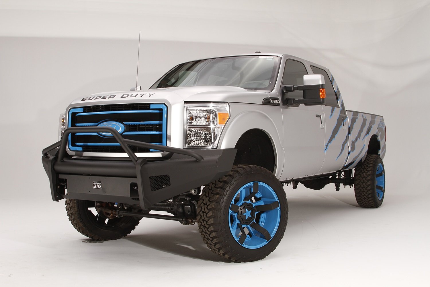 Fab Fours Elite Front Bumper FS99-Q1662-1 2 Stage Black Powder Coated w/Pre-Runner Grill Guard Incl. Light Cut-Outs