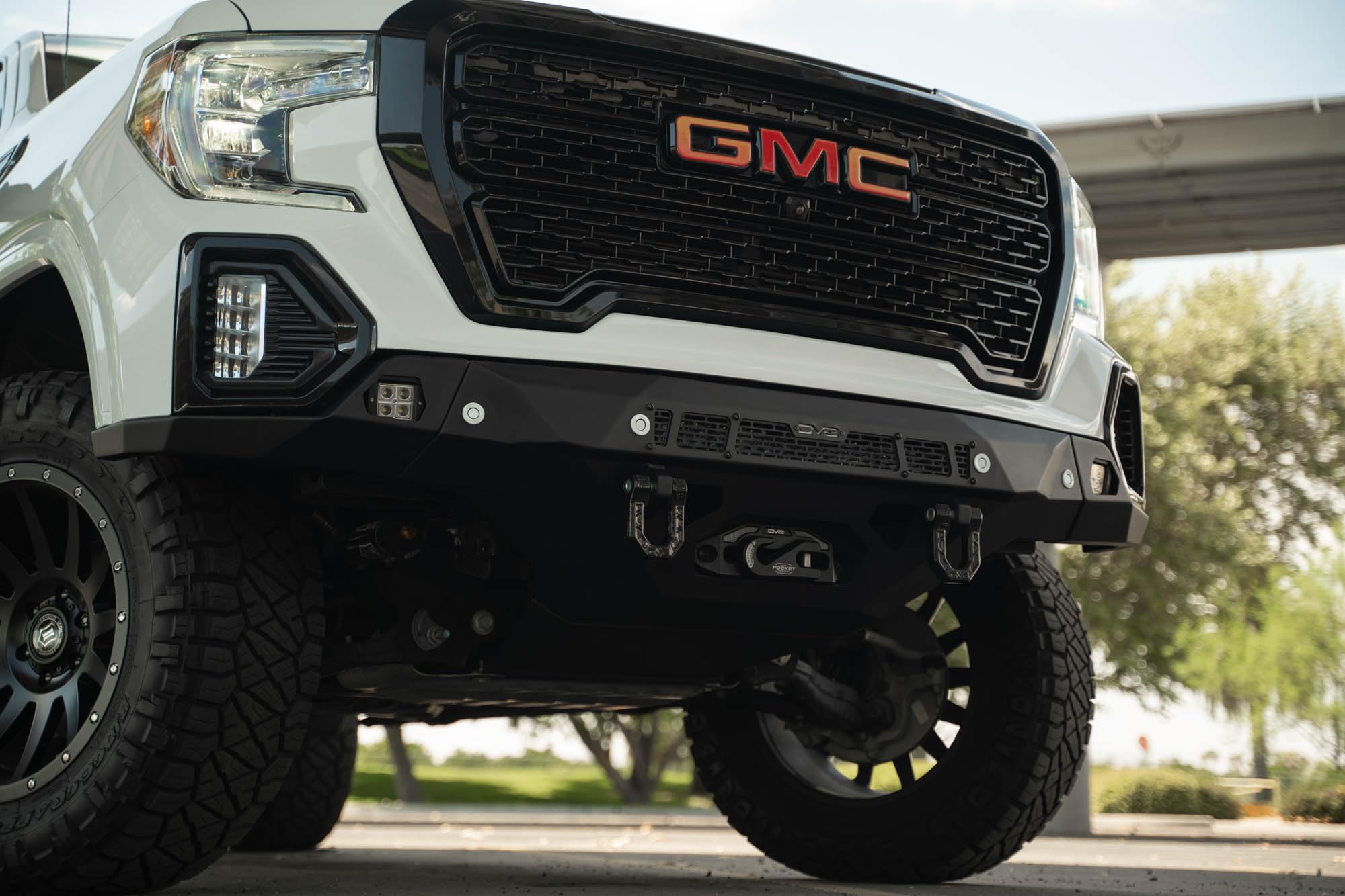 Front Bumper DV8 Spec Series for 2019-2021 GMC Sierra 1500 | Steel Front Skid Plate | One 20" Light Bar Mount | Two 3" Pod Light Mounts | Heavy-Duty Winch Mount | 2 D-Ring Mounts | Powder Coated Black