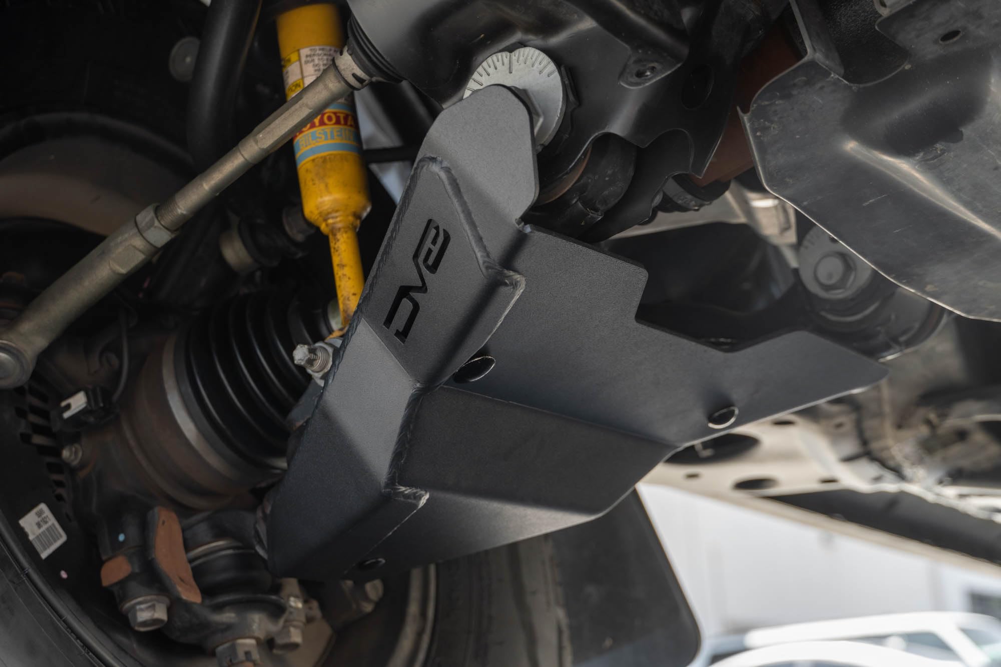 A-Arm Skid Plates for Toyota Tacoma 2016-2023 | Reinforced Leading Face for Protection Against Impacts | Fully Bolt-On | Carriage Bolt Hardware Included | Black Powder Coat Finish | Sold as a Pair