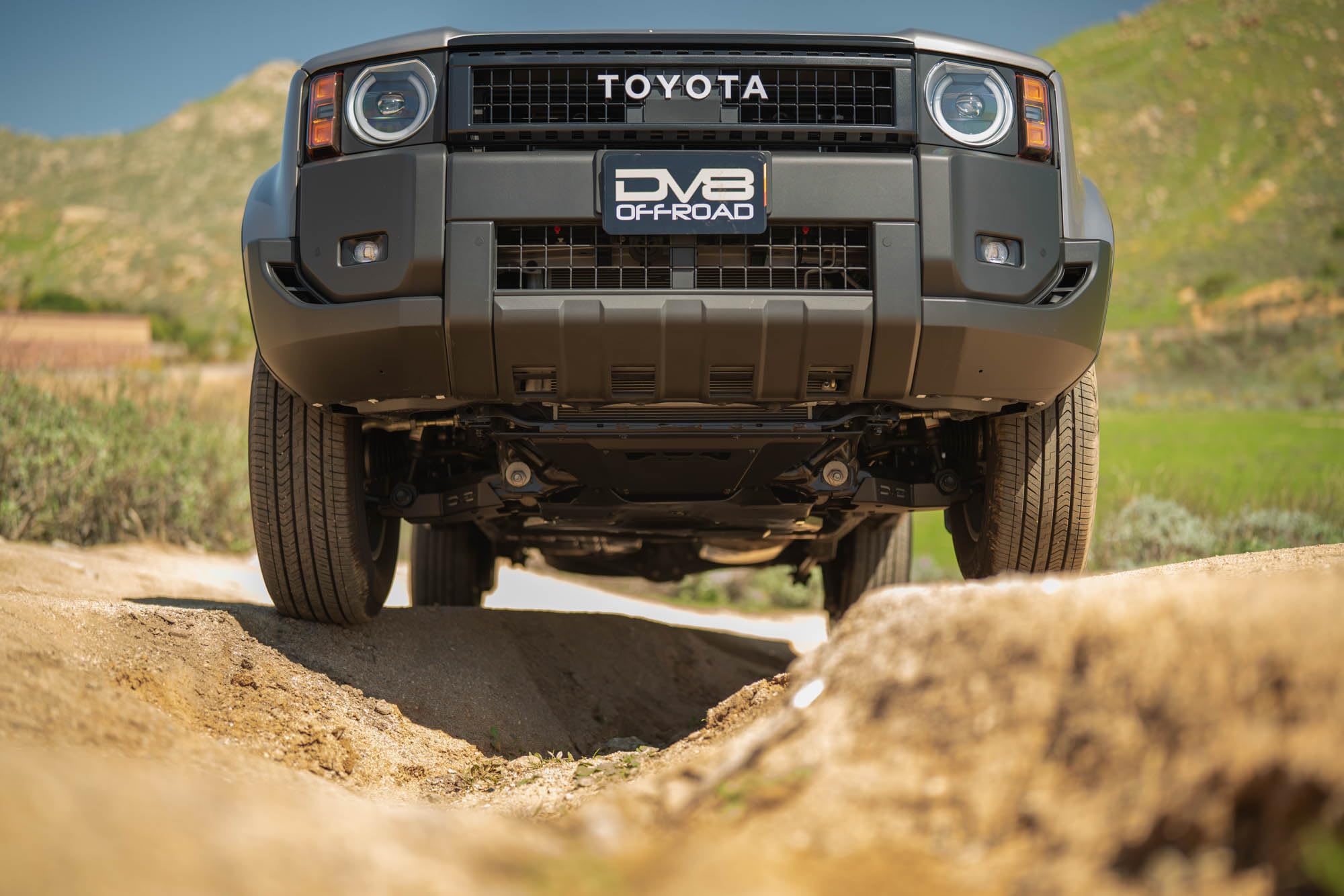 Front Skid Plate DV8 Offroad for 2024-2025 Toyota Land Cruiser | Protects Bottom of Engine & Intercooler | Installs to 4 Mounting Points for a Sturdy Design | Micro-Texture Black Powder Coat | Steel