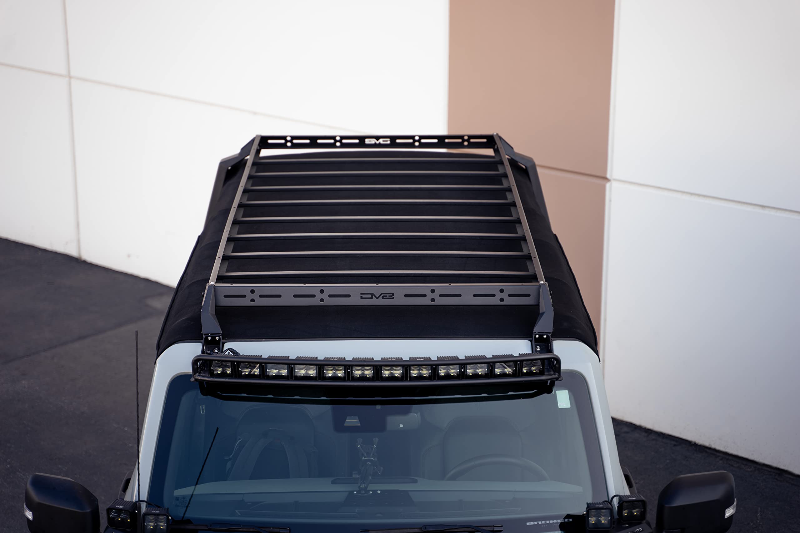 Soft Top Roof Rack DV8 Offroad for 2021-2025 Ford Bronco 4-Door | Bolt-On Installation | Multiple Tie Down Points | 200 lb Capacity | Multiple Accessories