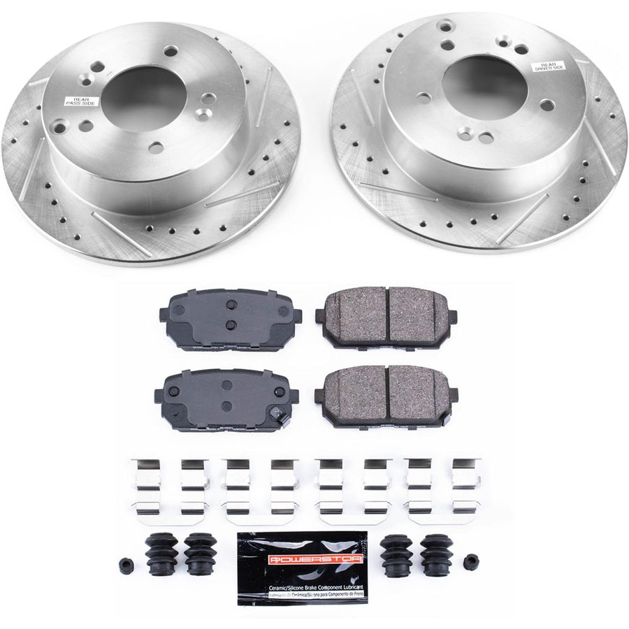 Rear Power Stop K5853 Z23 Carbon Fiber Brake Pads with Drilled & Slotted Brake Rotors Kit For Kia Rondo 2007-2010 [Model Specific]