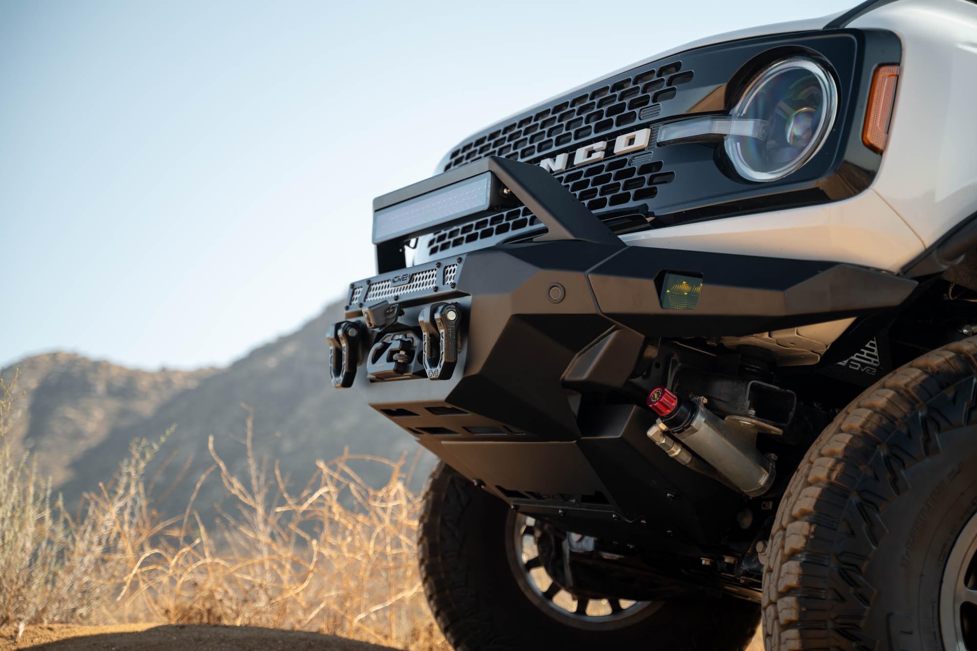 DV8 Offroad Low Pro Skid Plate for 2021-2025 Ford Bronco | Designed for DV8 Front Bumpers | Vented for Improved Airflow | Durable Steel Construction | Bolt-On Installation | Powder Coated Black