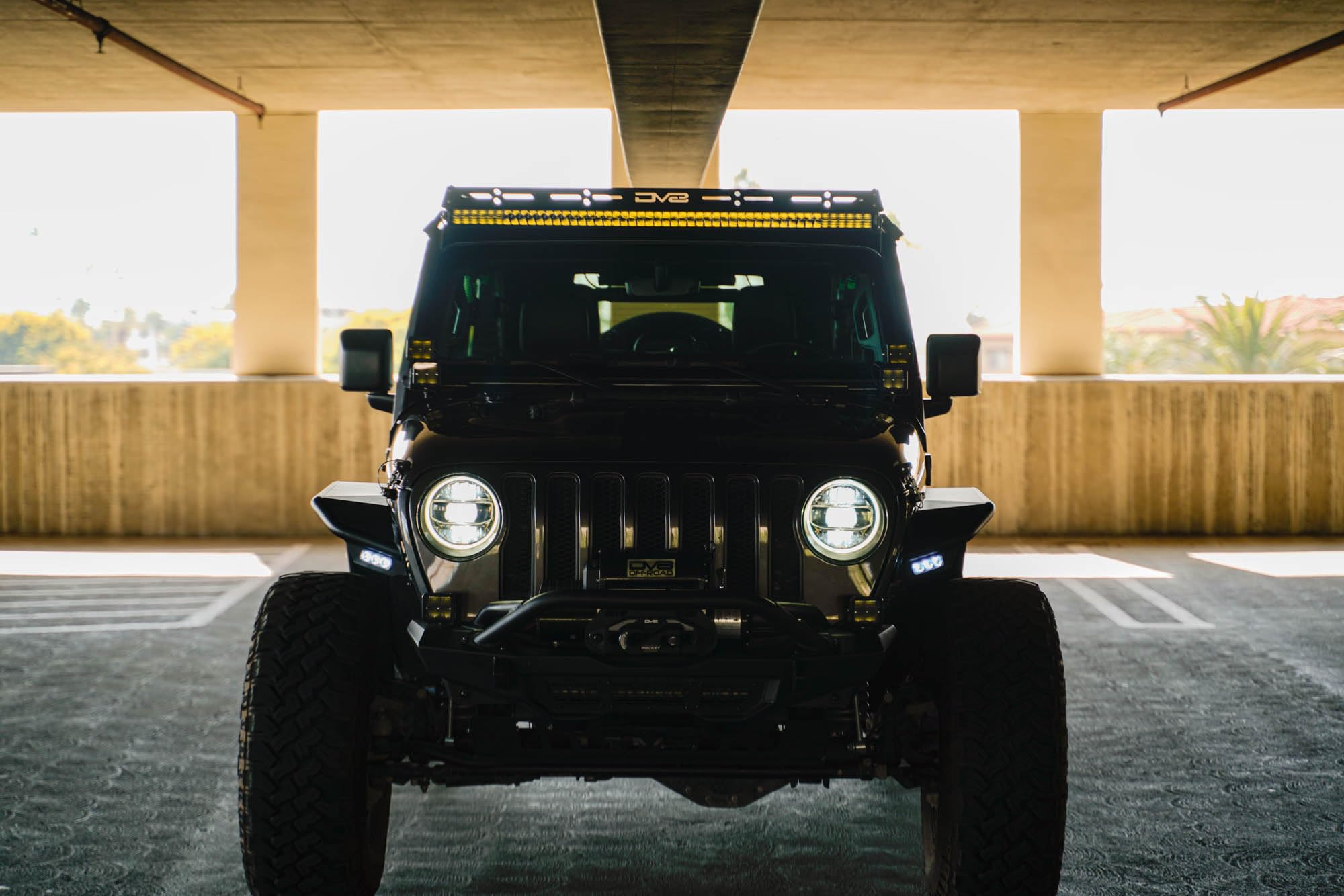 50" Light Bar Mount DV8 Offroad for 2018-2025 Jeep Wrangler JL & 2020-2025 Gladiator JT | Optional 3" Pod Light Mounts | Sleek Low-Profile Design | Black Powder Coat | Bolt-On Installation | Steel