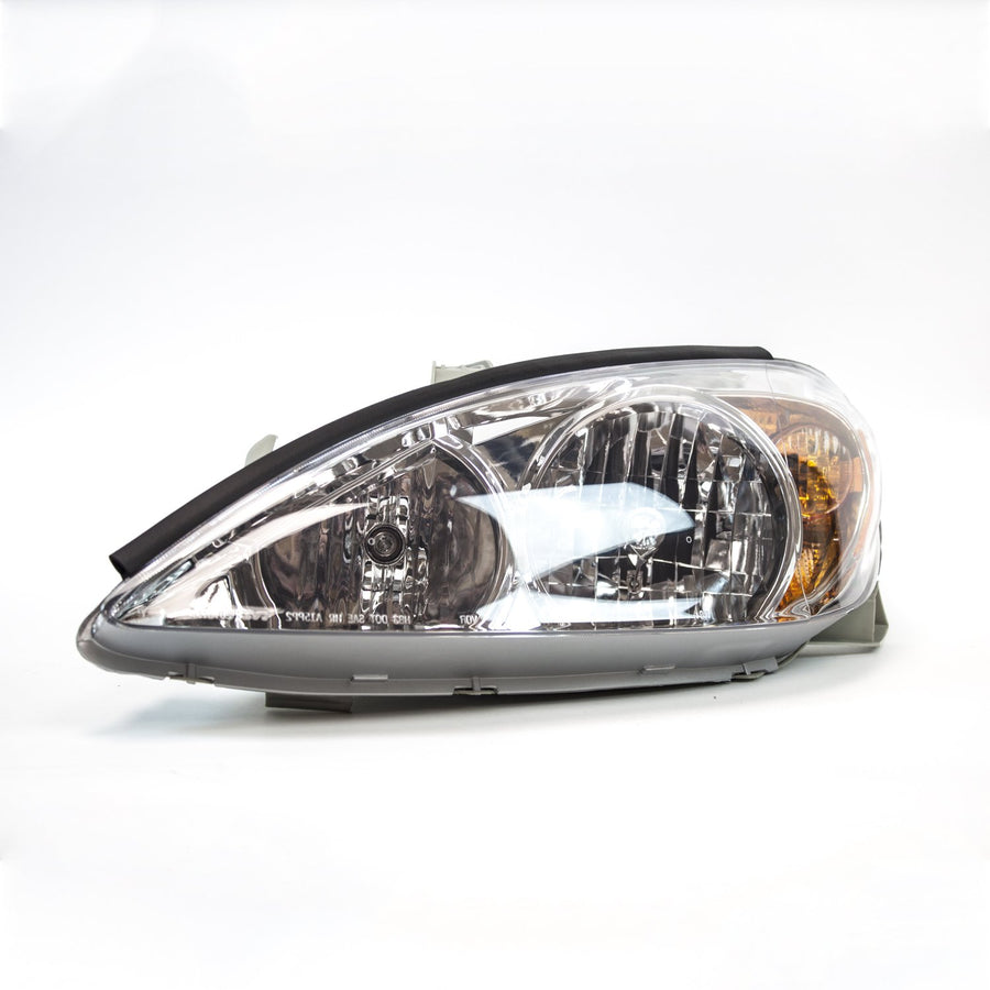 Left TYC Headlight Assembly Compatible with 2002-2004 Toyota Camry