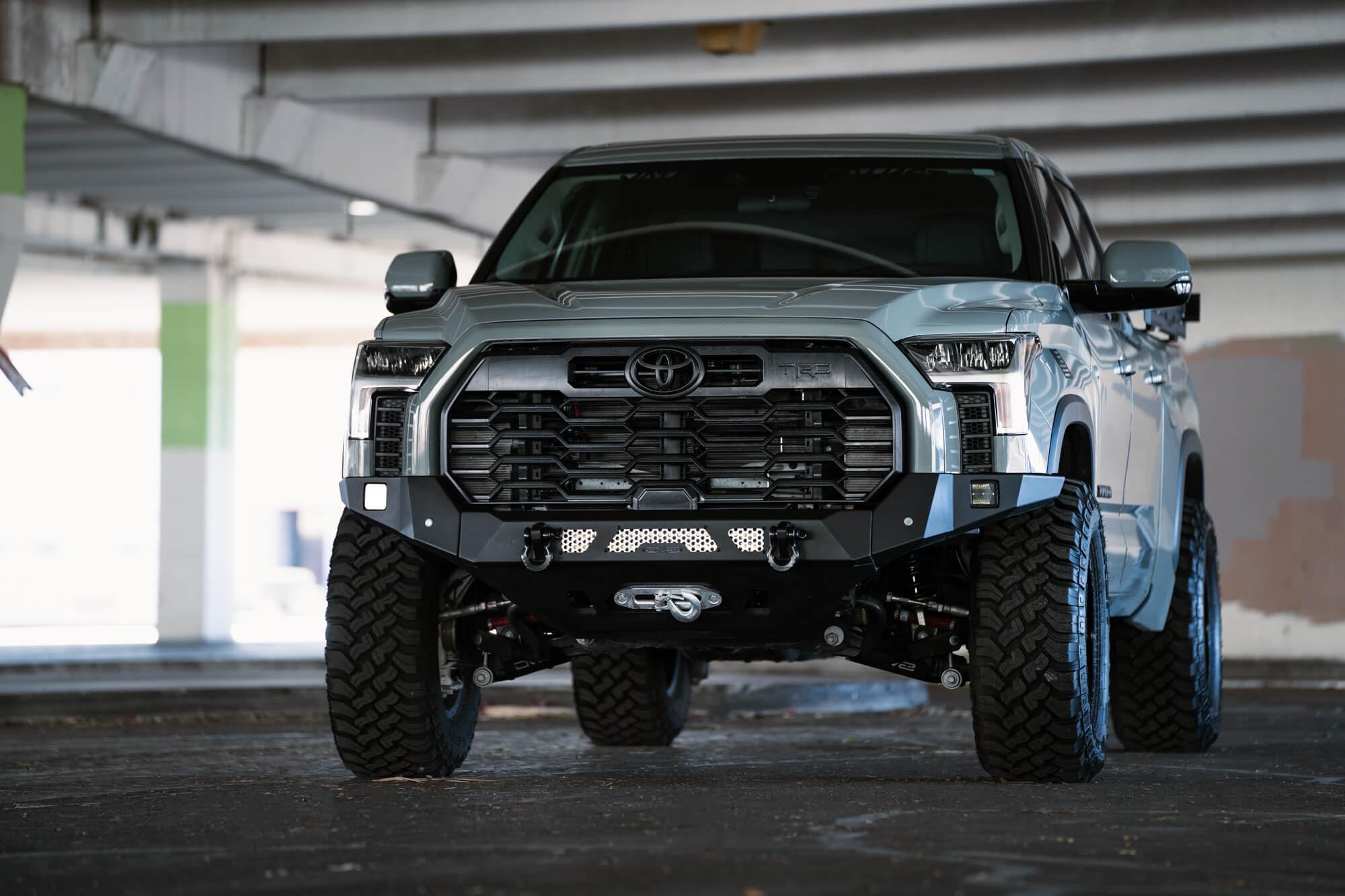 MTO Series DV8 Offroad Winch Front Bumper for 2022-2025 Toyota Tundra | Retains OEM Features | Mount LED Light Bar & Pod Lights | Accepts Multiple Size Winches | Compatible with Stock Skid Plates