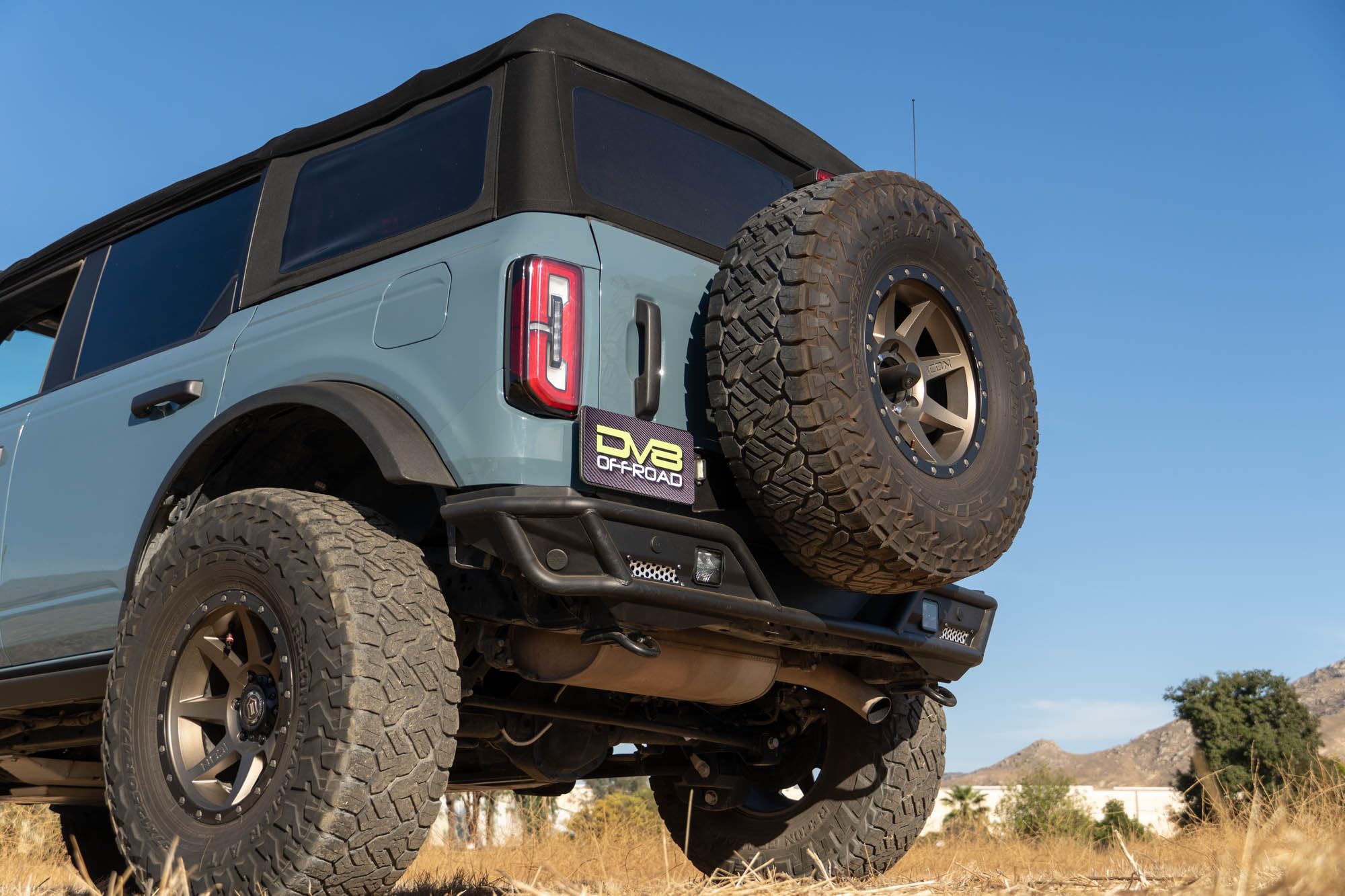 Offroad DV8 Tire Carrier for 2021-2025 Ford Bronco | Heavy-Duty Design | Absorbs Weight of Spare Tire & Tailgate Door | Included Third Brake Light Extension | Fully Bolt-On Installation | Steel