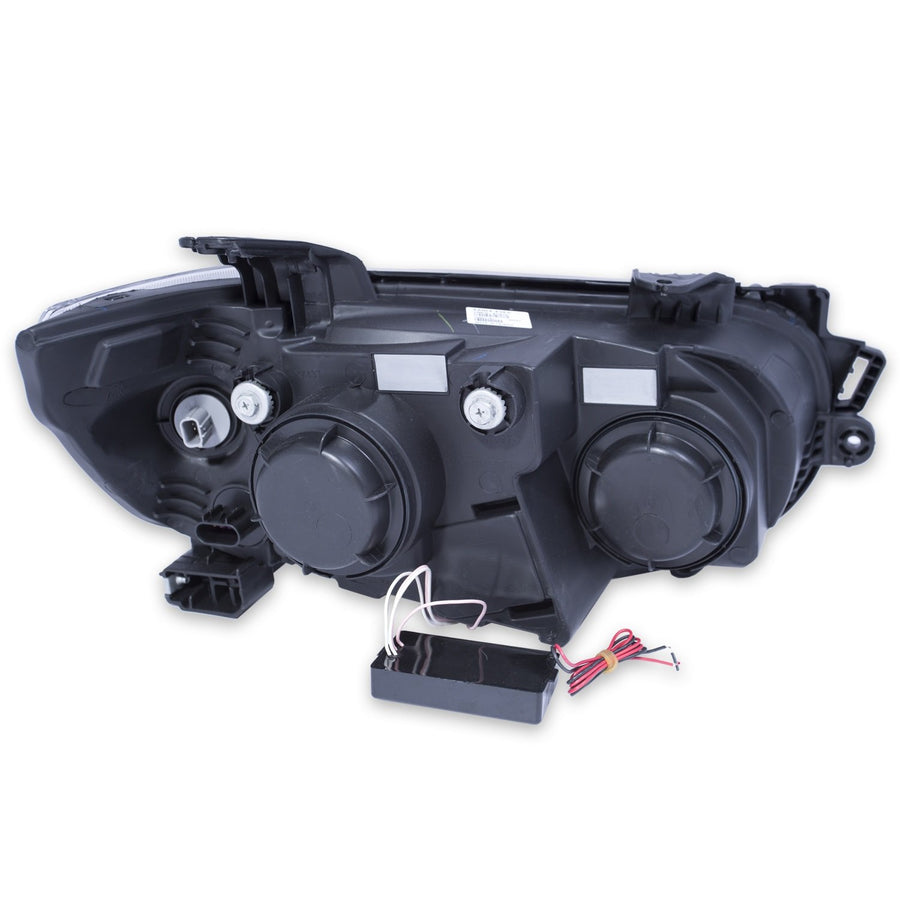 Halogen Projector Headlight AnzoUSA 121488 for Chevrolet Sonic Black/Clear/Amber