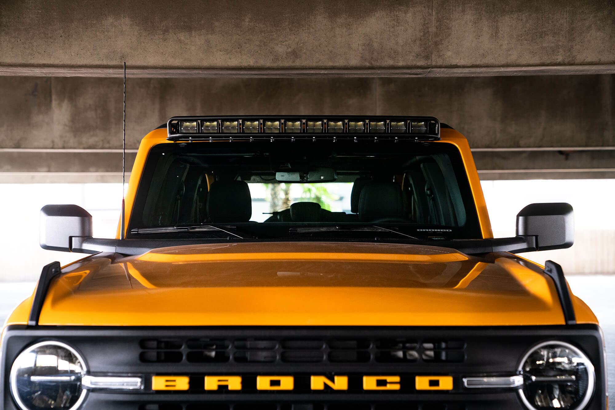 40" Curved LED Light Bar Mount DV8 Offroad for 2021-2025 Ford Bronco | Fits (1) 40" Curved LED bar or up to (12) 3" pods | Mounts to OEM Accessory Location | No Drill Installation