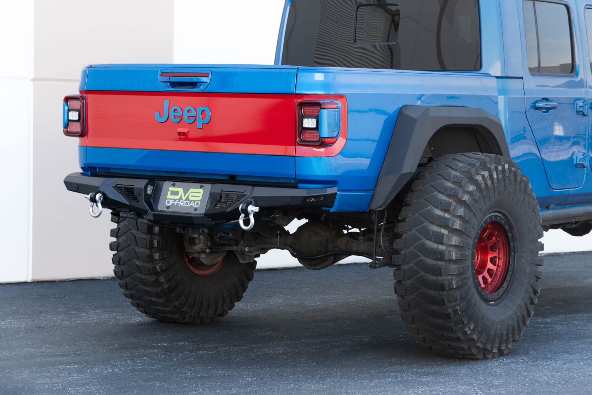 DV8 Offroad Rear Bumper Spec Series for 2020-2025 Jeep Gladiator JT | High Clearance Design | Accepts (2) up to 3" Pod Lights | Compatible OEM Hitch & Factory Sensors | ¾” D-Ring Shackles