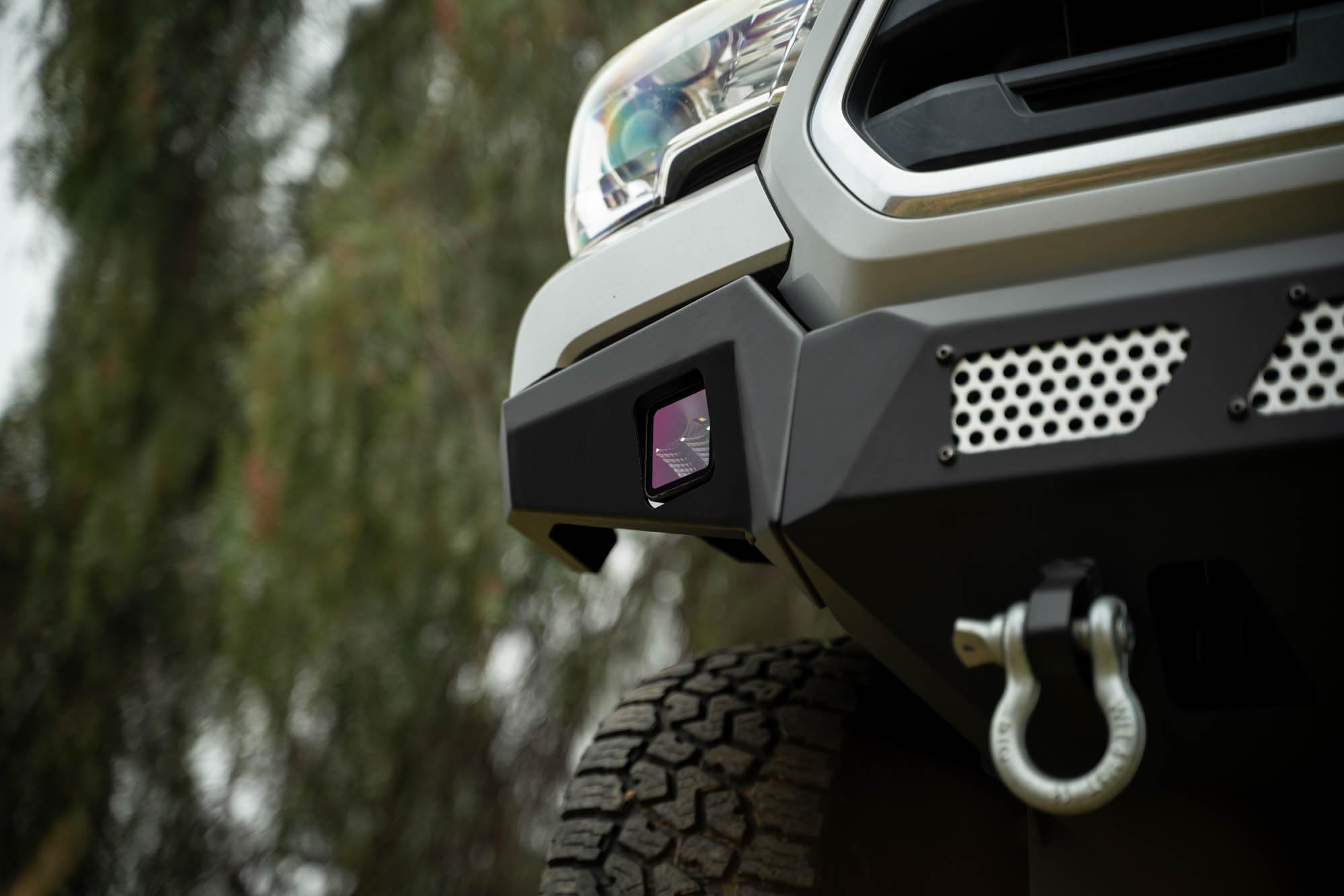 Winch Front Bumper DV8 MTO Series for 2016-2023 Toyota Tacoma | High Clearance Fitment | Mounts up to a 12,000lb Rated Winch | Integrated Light Bar and Pod Light Mounts | Black Powder Coat Finish