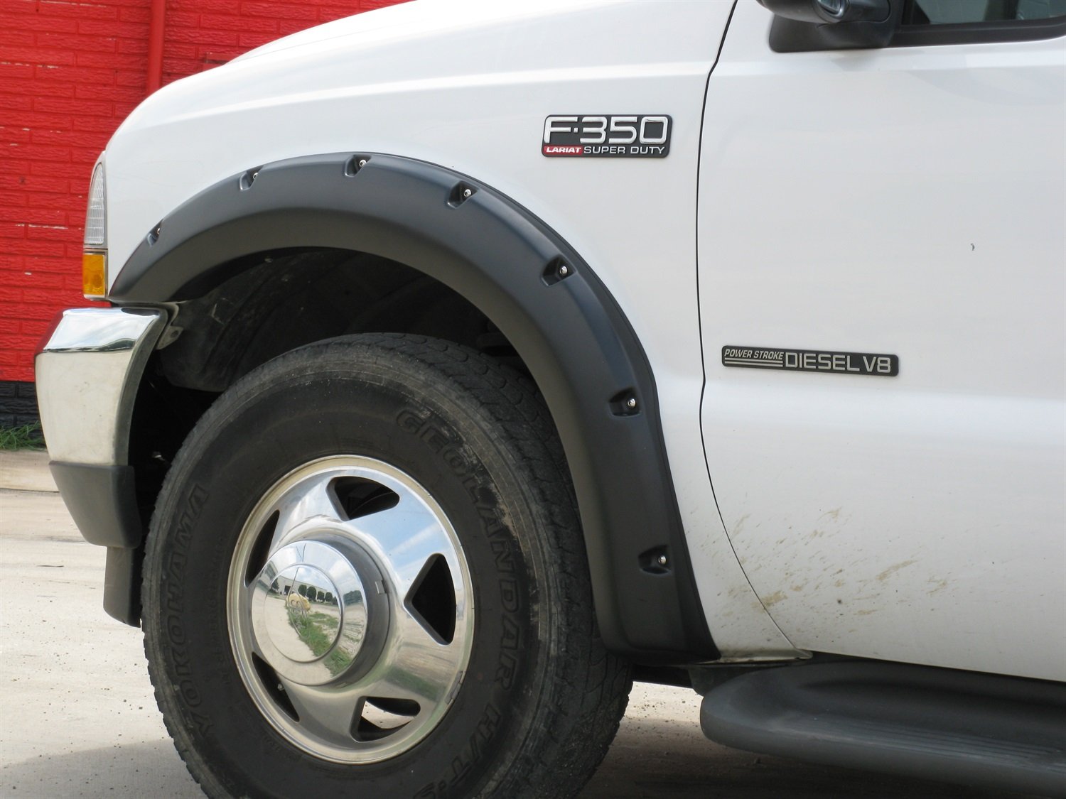 Lund Elite Series RX311TA Black Rivet Style Textured Front Fender Flare - 2 Piece