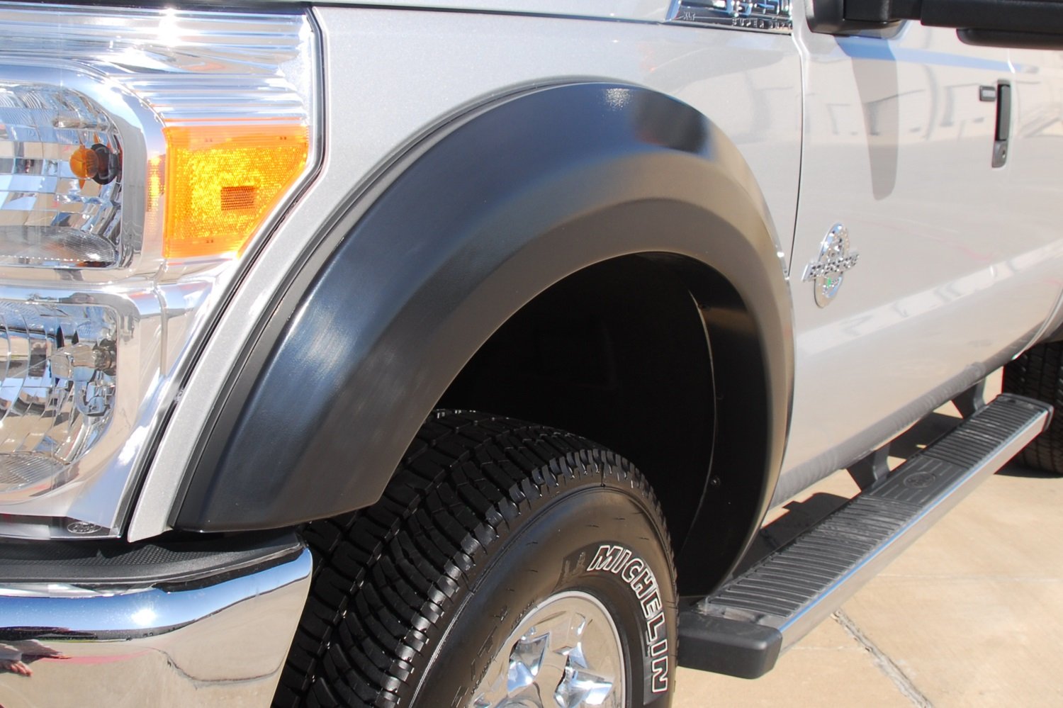 Lund Elite Series EX314T Black Extra Wide Style Textured Front and Rear Fender Flare - 4 Piece