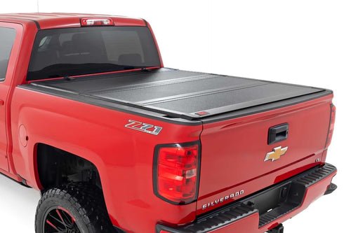 Rough Country Hard Tri-Fold Tonneau Cover for Chevy Silverado & GMC 1500/2500HD/3500HD (2014-2019) - Aluminum Flip-Up Bed Cover, Fits 6'7 (78.8-78.9") Bed w/Rail Caps