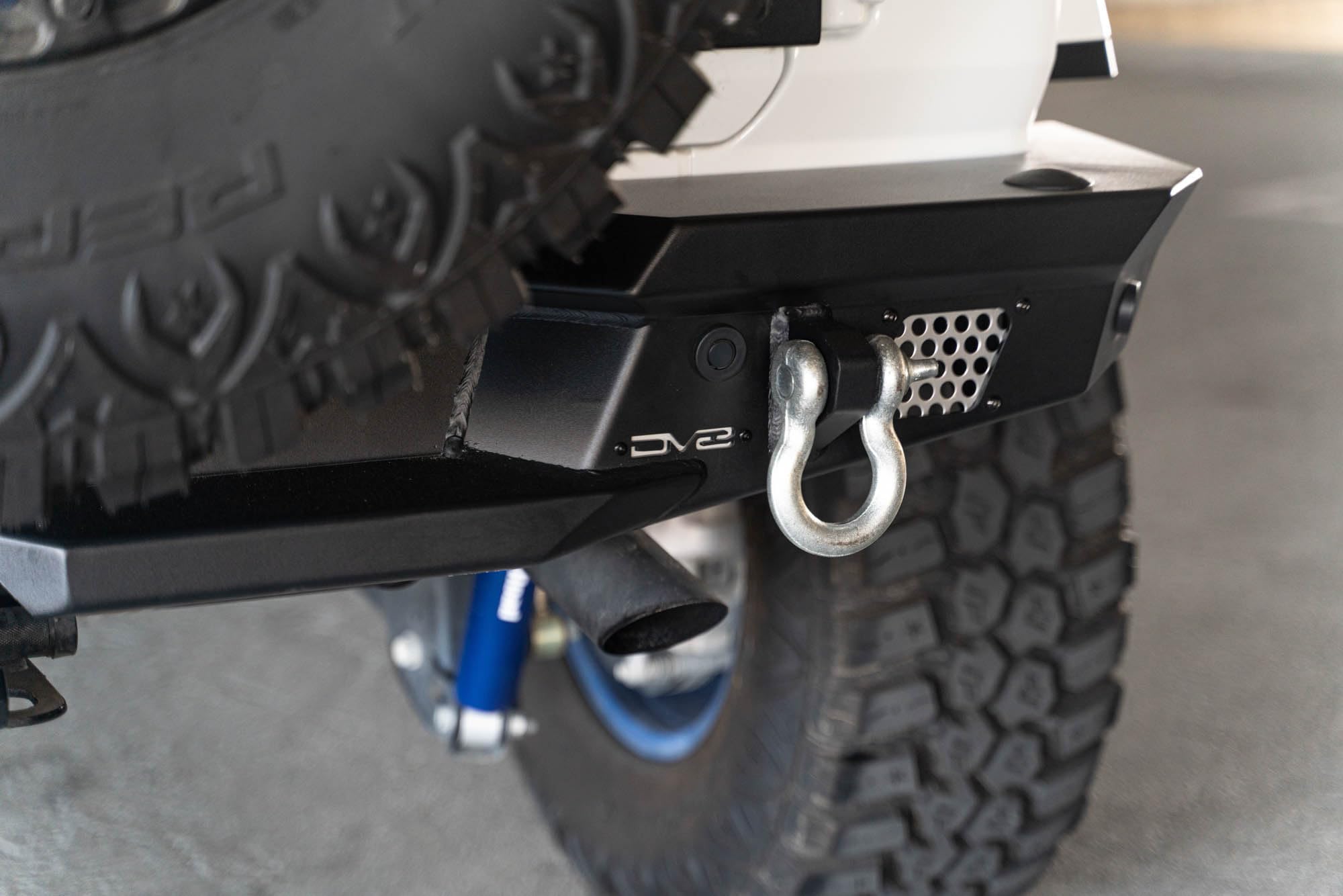 MTO Series DV8 Offroad Rear Bumper for 2018-2025 Jeep Wrangler JL | Full Width Matching Factory & Aftermarket Fenders | Compatible w/Factory Hitch & Harness | OEM Mount Can Fit up to a 37” Spare Tire