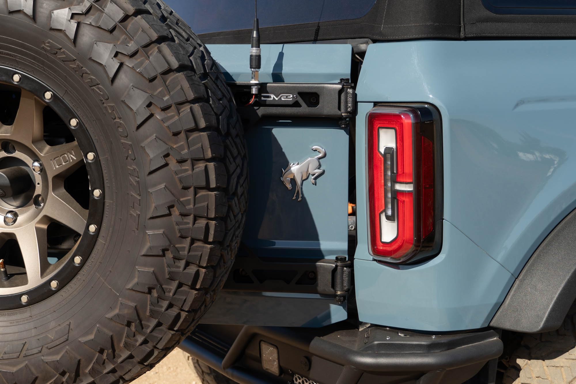 Offroad DV8 Tire Carrier for 2021-2025 Ford Bronco | Heavy-Duty Design | Absorbs Weight of Spare Tire & Tailgate Door | Included Third Brake Light Extension | Fully Bolt-On Installation | Steel