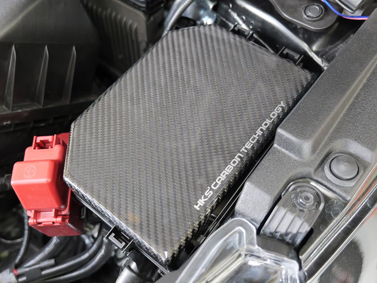 2023 HKS Toyota GR Corolla Dry Carbon Fuse Box Cover