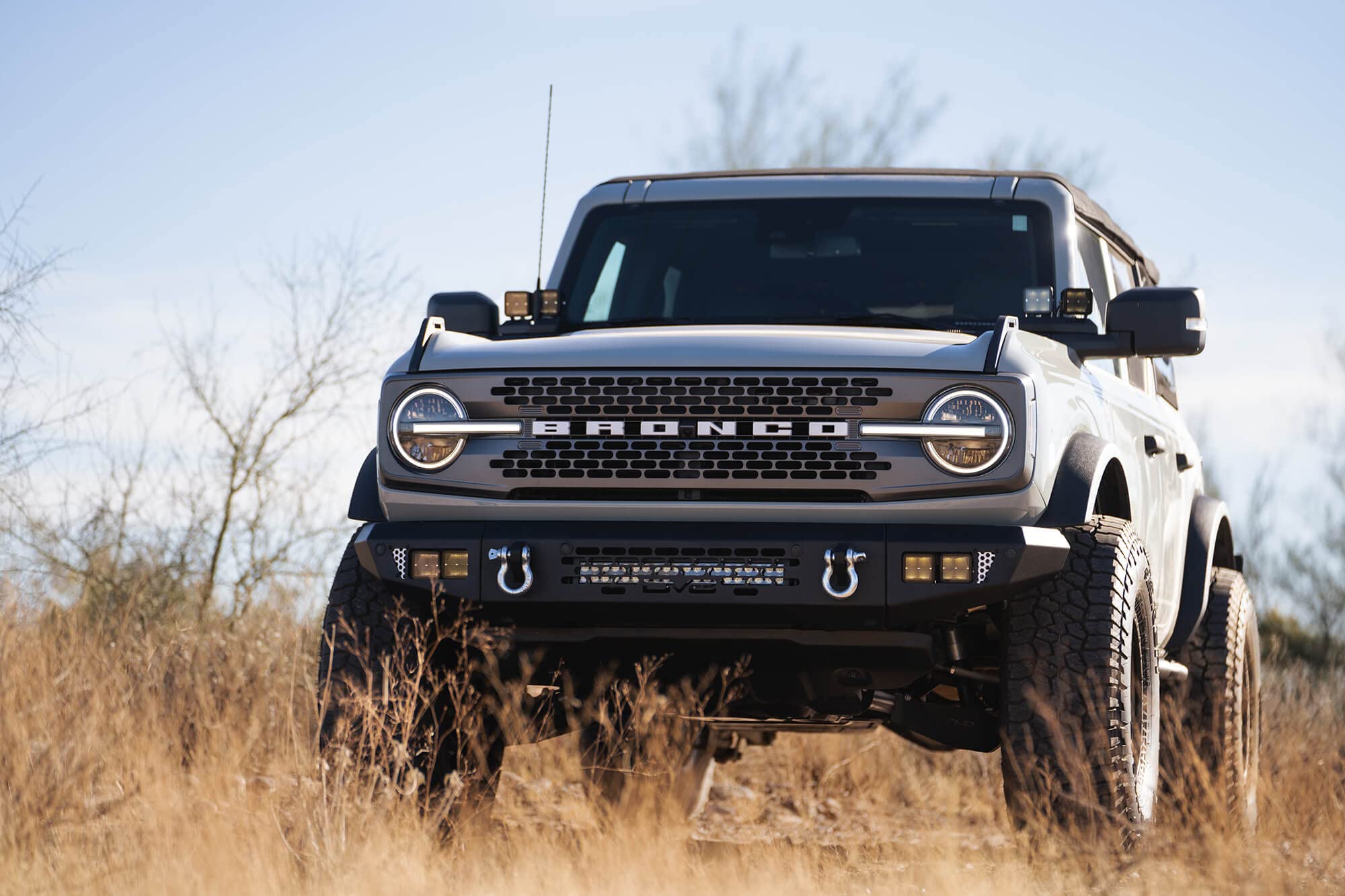OE Plus Series DV8 Offroad Front Bumper Compatible with 2021-2025 Ford Bronco | Multiple Light Mounts | Compatible with OEM Skid Plate, 360° Camera, & Sensors | Reinforced D-Ring Mounts