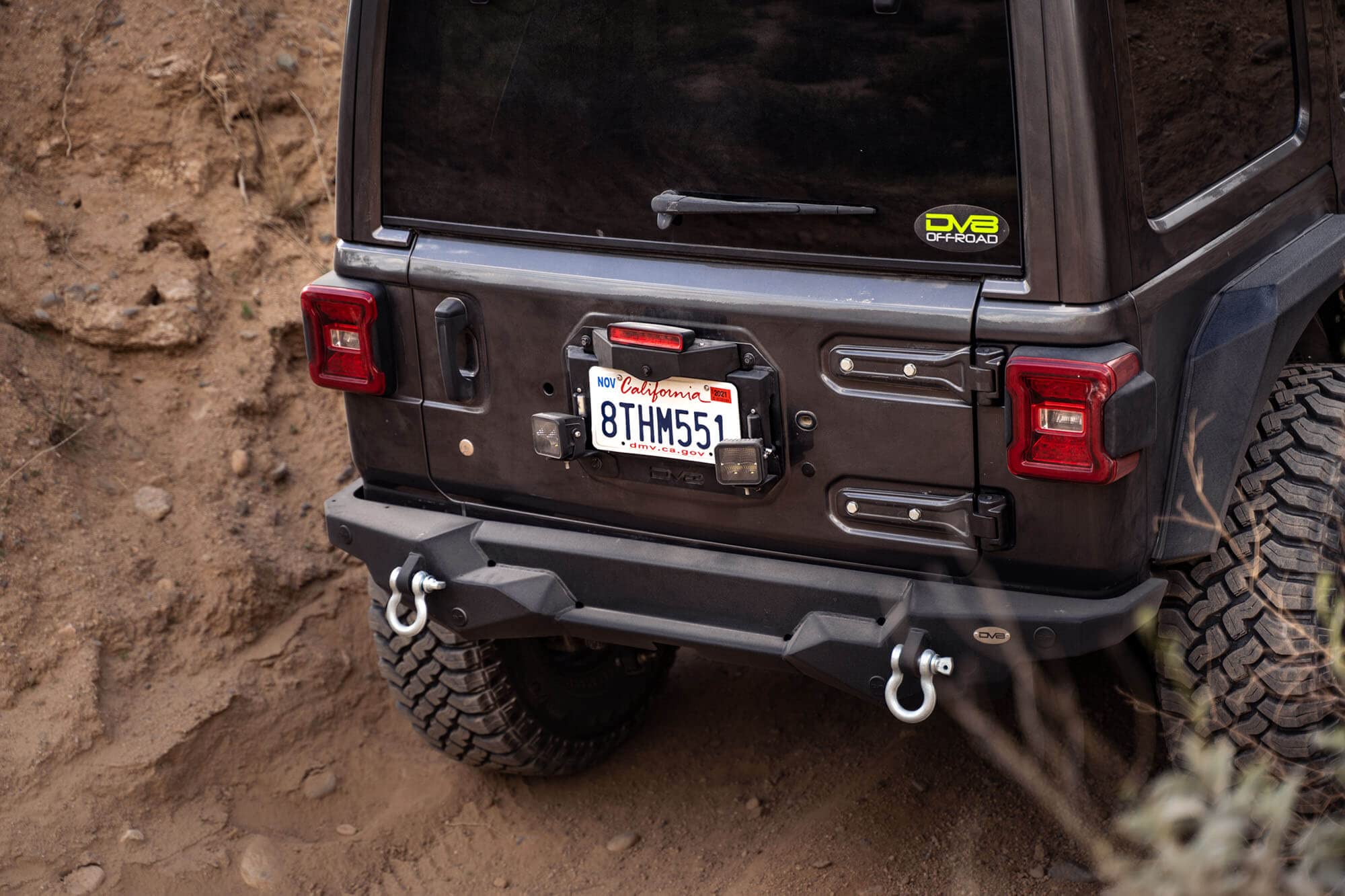 Delete Spare Tire Kit for 2018-2022 Jeep Wrangler JL | Includes 2 Pod Light Mounts | Retains OEM Back Up Camera & 3rd Brake Light | License Plate Bracket Included | DV8 Offroad