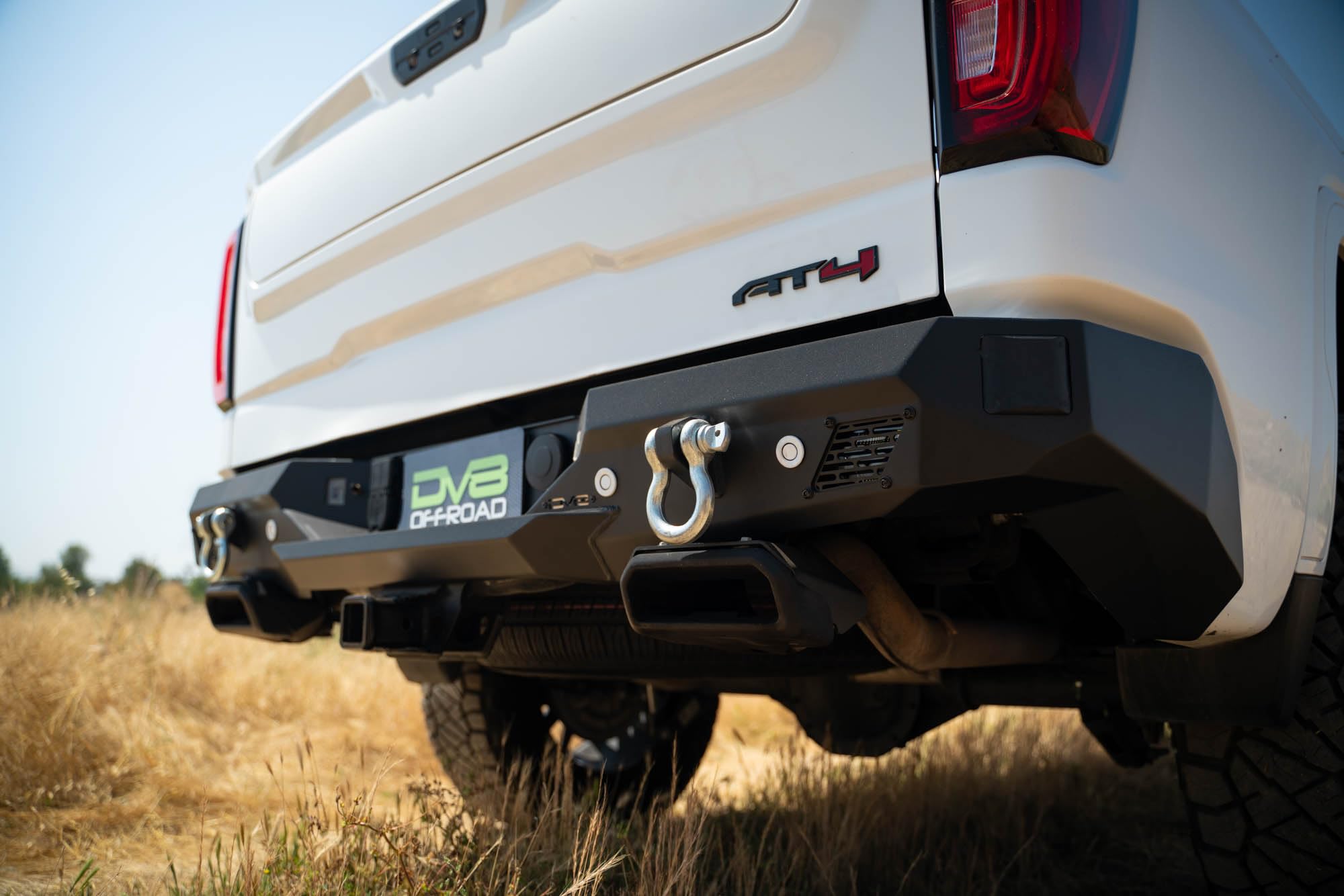 DV8 Offroad Rear Bumper Spec Series Compatible with 2019-2024 GMC Sierra & Chevy Silverado 1500 | Two 3-inch Pod Light Mounts | Integrated D-Ring Mounts | Fully Bolt-On Installation
