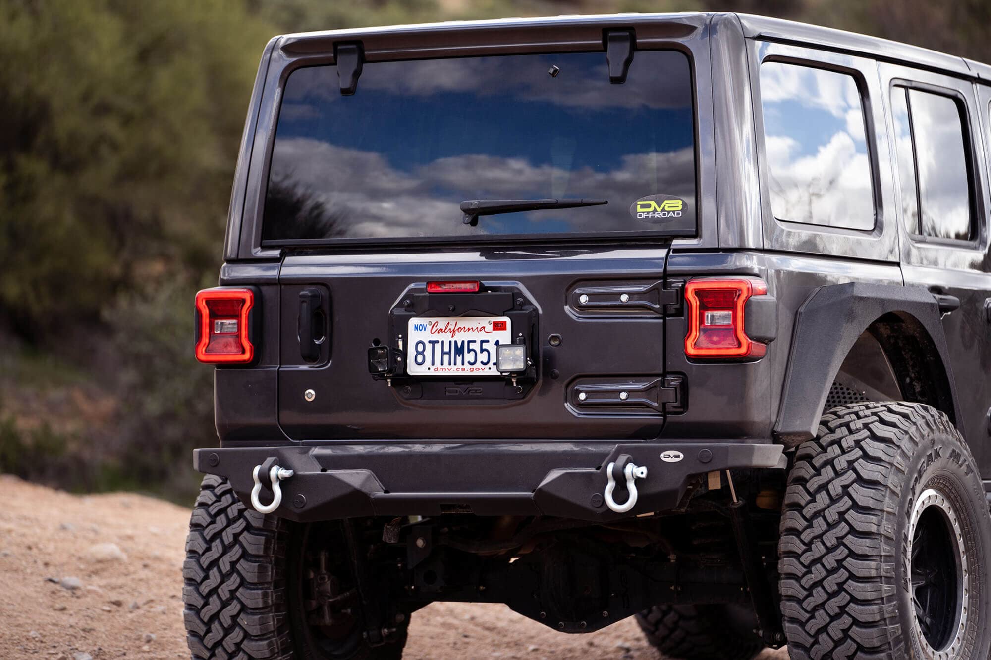 Delete Spare Tire Kit for 2018-2022 Jeep Wrangler JL | Includes 2 Pod Light Mounts | Retains OEM Back Up Camera & 3rd Brake Light | License Plate Bracket Included | DV8 Offroad