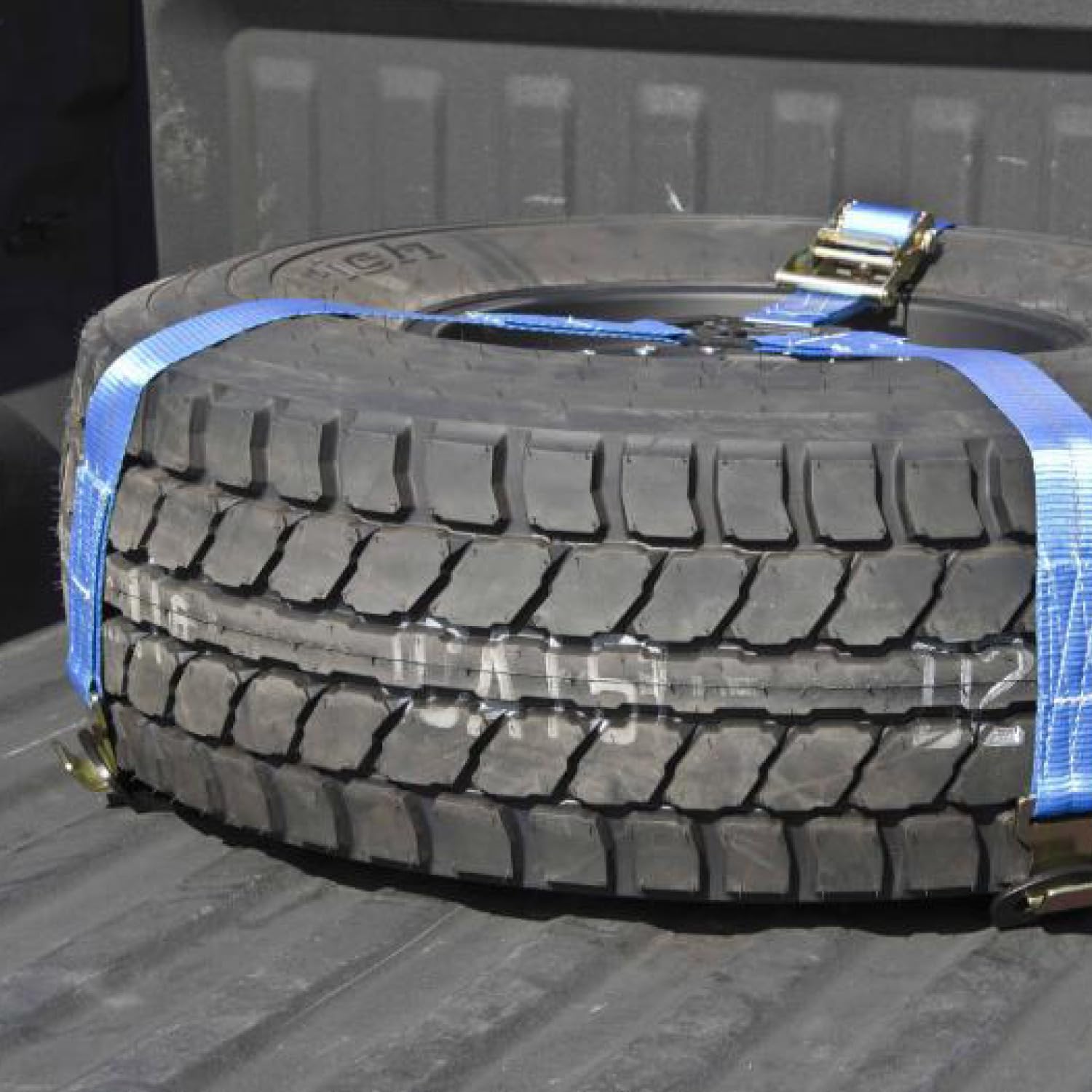 Truck Bed Tire Carrier RealTruck | Textured Black, Blue Strap, Solid Welded Construction | BM1TCBK-TX | Universal