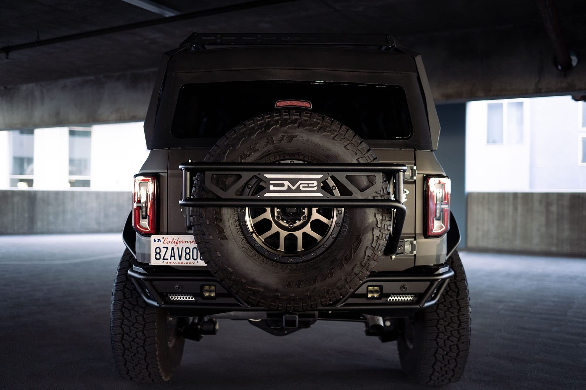 Spare Tire Guard & Accessory Mount DV8 Offroad for 2021+ Ford Bronco | Accepts Up to (Most) 37" Tires | Can Accept Locking Pins | Quick and Easy Install | Paintable Aluminum Panels