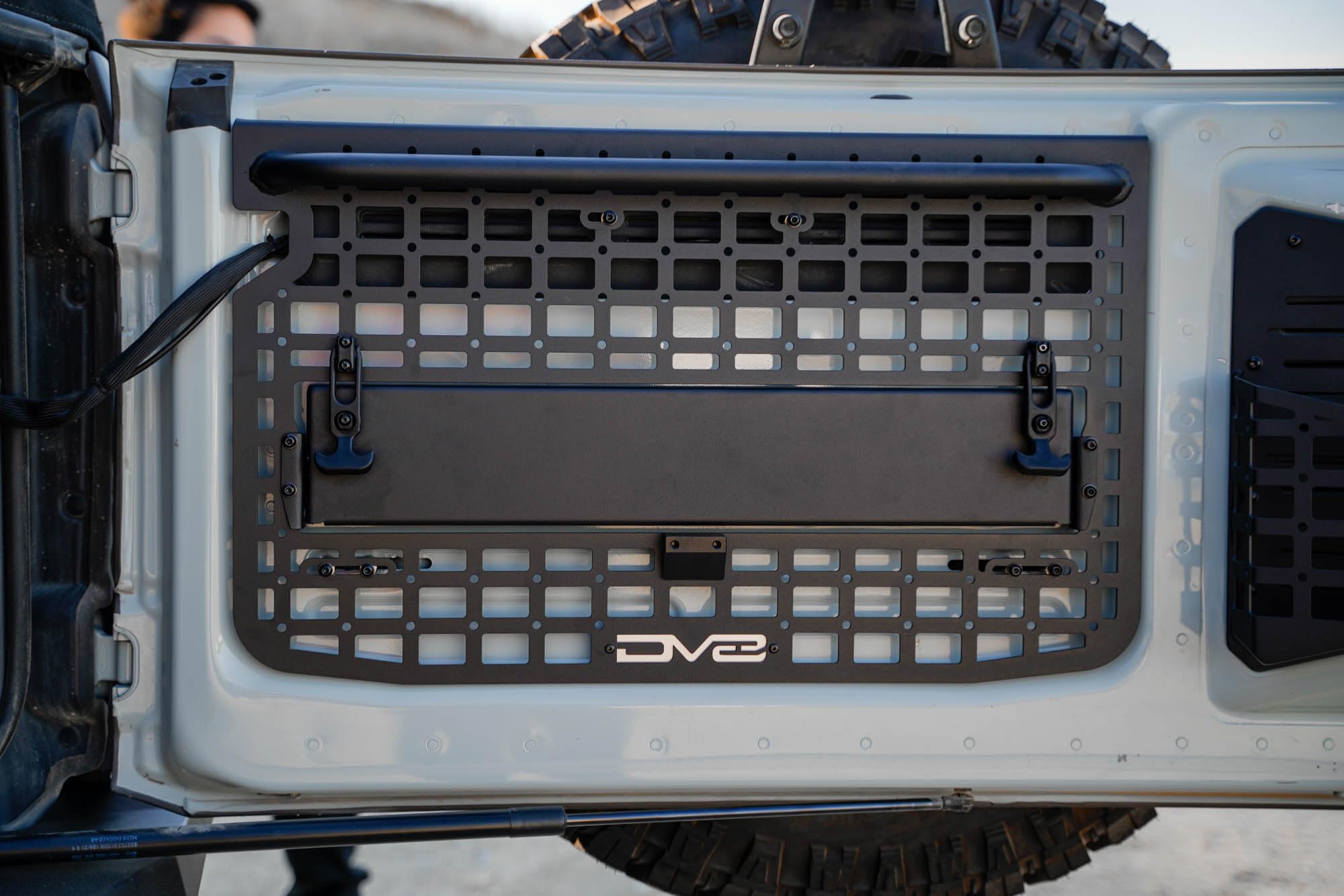 Tailgate Molle Panel DV8 Offroad for The 2021-2025 Ford Bronco | Perfect for Molle Bags, Knife Sheaths, Med Kits, Recovery Gear & More | Drop-Down Tray for Holding Drinks & Other Gear While at Camp