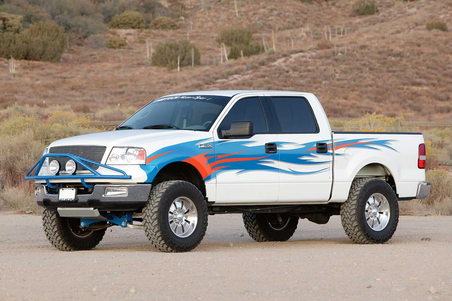 Fabtech Performance K2001DL Crossmember System w/DLSS Shocks 6 in. Lift Front Coilovers Crossmembers Spindles Bump Stops U-Bolts Rear Shocks All Required Hardware Crossmember System