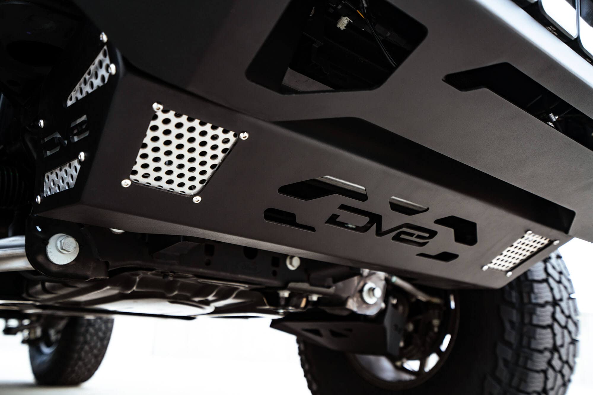 Steel Front Skid Plate DV8 Offroad for 2021-2025 Ford Bronco | Protects Front Underbody | Paintable Aluminum Inserts | Bolt-on Installation | Black Finish