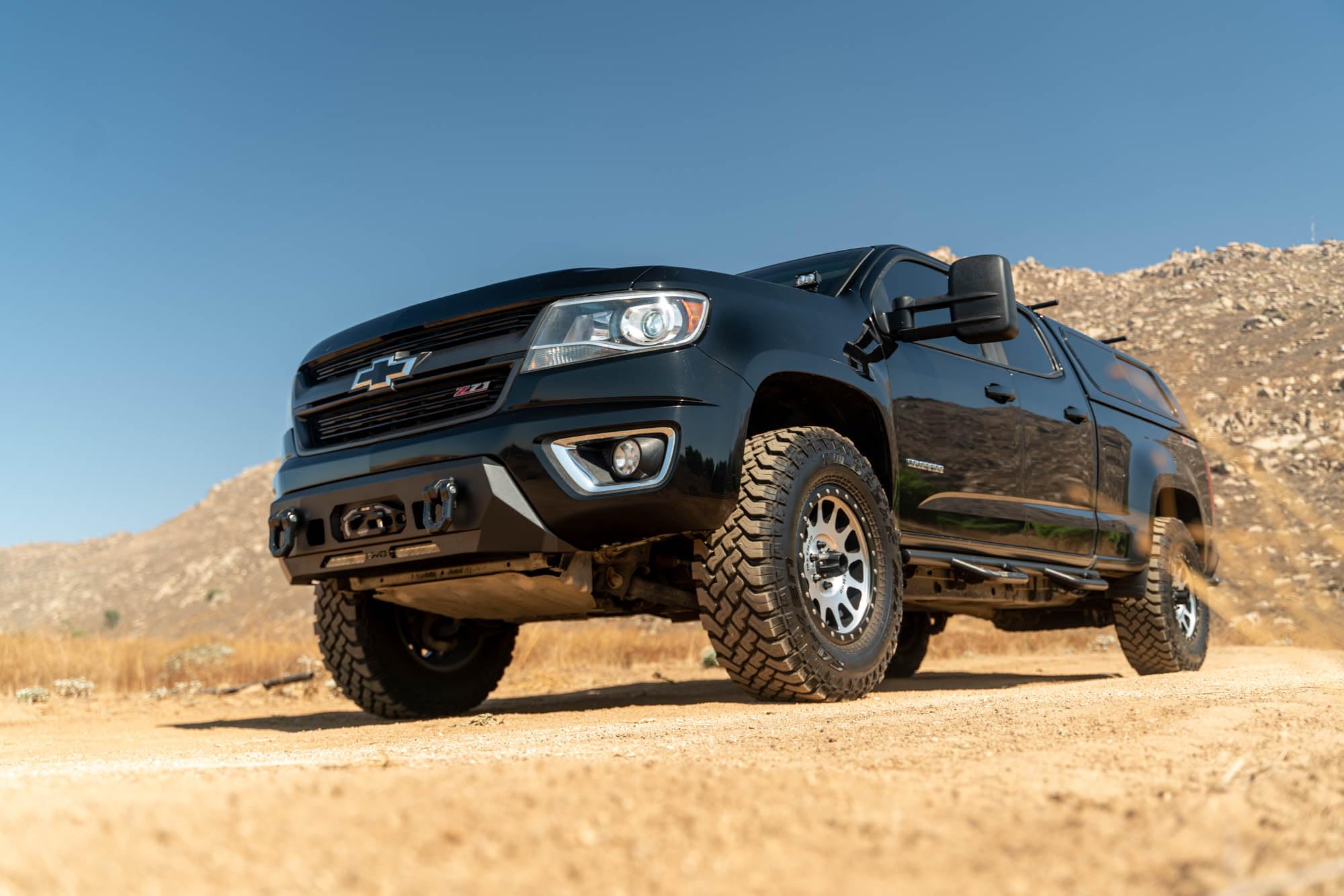Centric DV8 Offroad Front Bumper for 2015-2020 Chevy Colorado | Center Mount Design | (1) 20" Light Bar Mount | Heavy-Duty Winch Mount | Pair of D-Ring Mounts | (2) 3" Pod Light Mounts | Steel