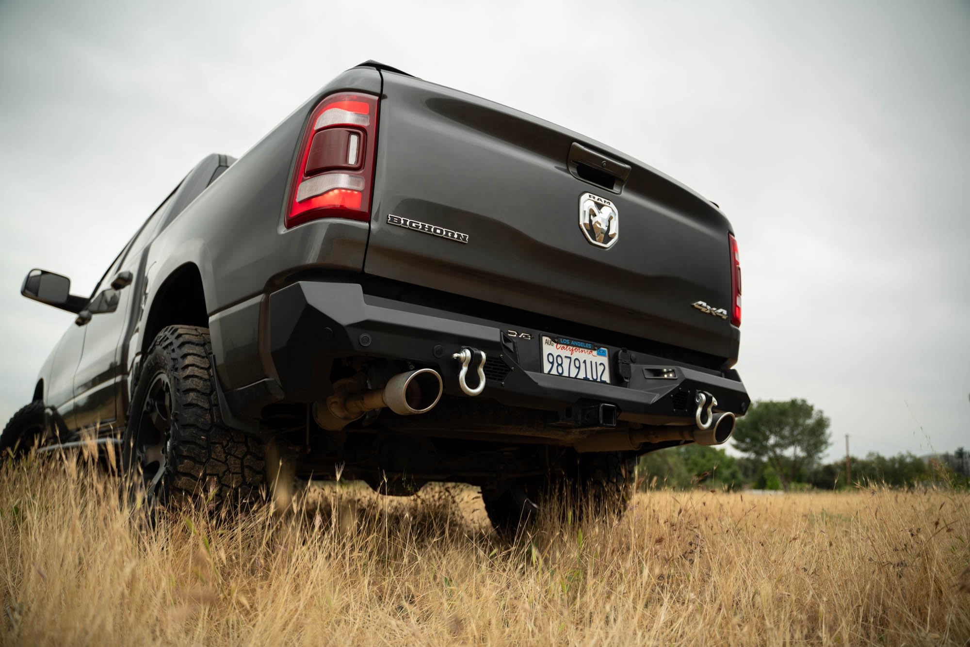 DV8 Offroad Rear Bumper Spec Series Compatible with 2019-2024 Ram 1500 Single and Dual Exhaust Models | Mount two 3" Pod Lights | Recovery Points | Fully Bolt-On | Powder Coated Finish