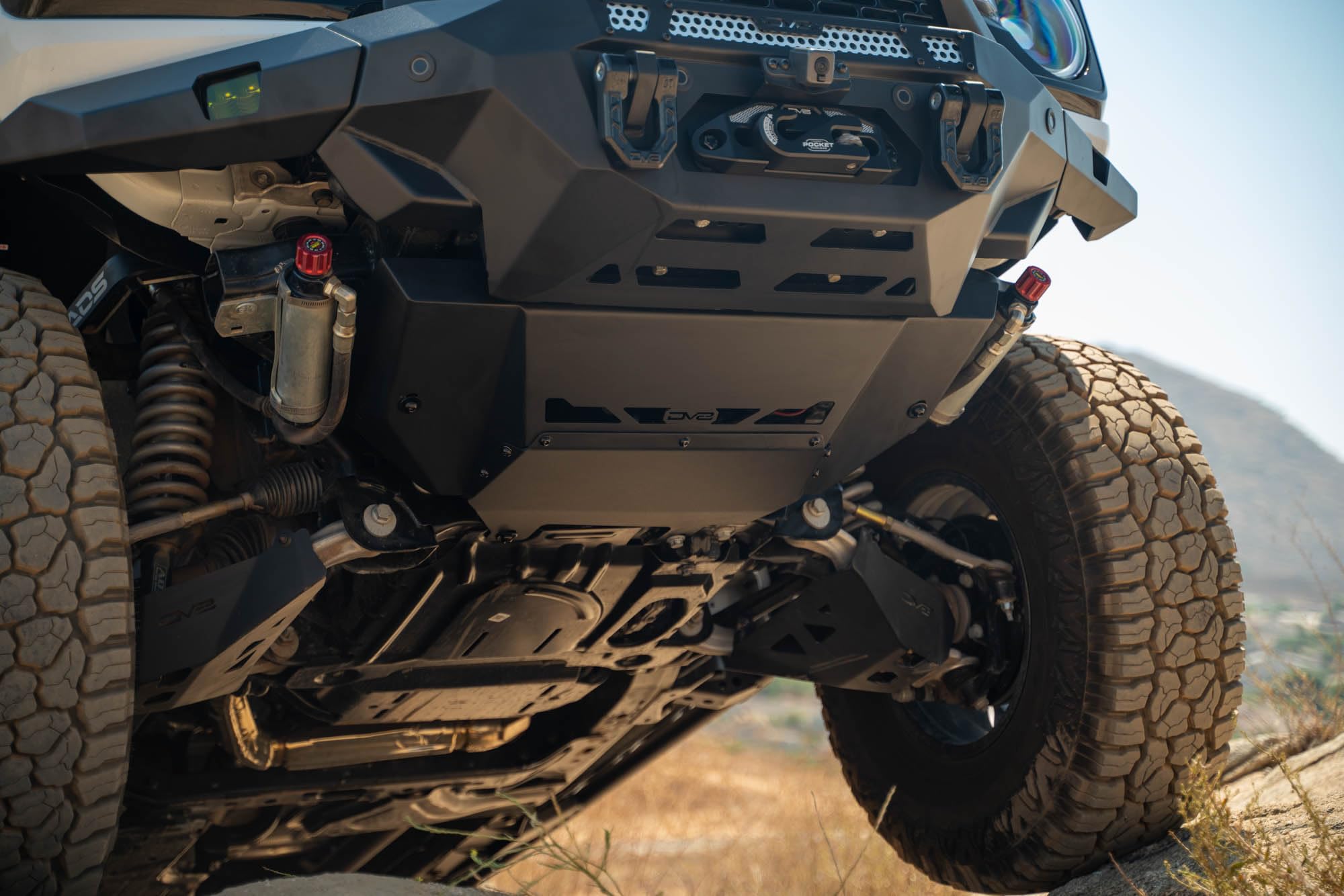 DV8 Offroad Low Pro Skid Plate for 2021-2025 Ford Bronco | Designed for DV8 Front Bumpers | Vented for Improved Airflow | Durable Steel Construction | Bolt-On Installation | Powder Coated Black