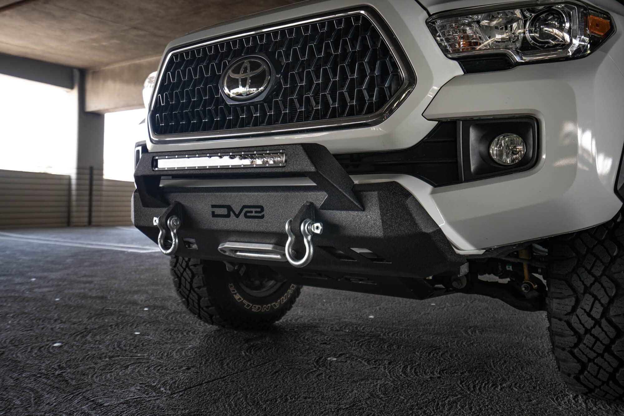 FBTT1-05 DV8 Offroad | Front Bumper fits 2016-2021 Toyota Tacoma | Center Inlay Only | Winch Mount Included | Bull Bar | Strategic Airflow Cutouts | Welded Light Tabs, Black
