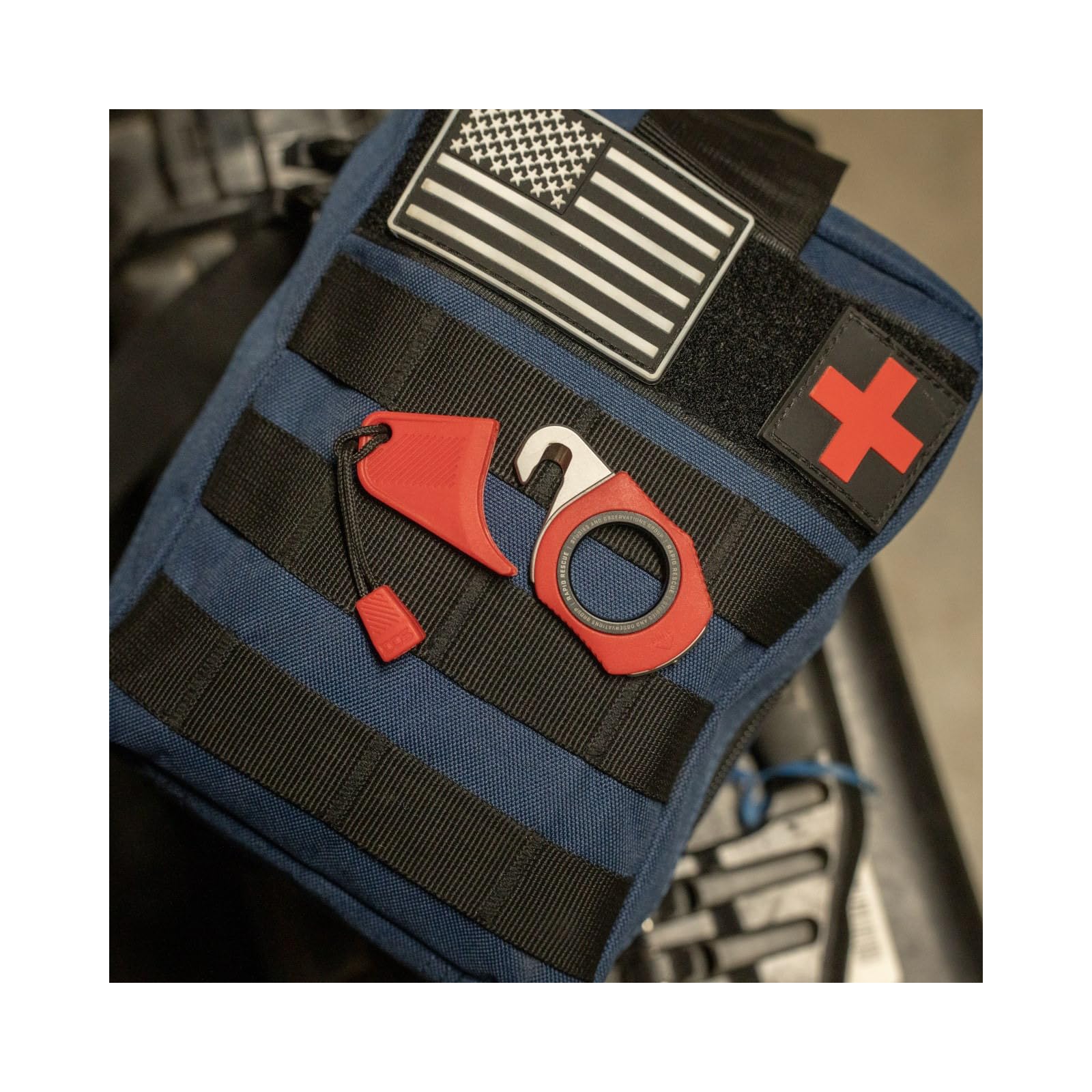 Rapid Rescue SOG Multi-Tool | Stainless Steel Seatbelt Cutter, GRN Handle, Aluminum Pull-Ring, Quick to Deploy from The Sheath, Rescue Red