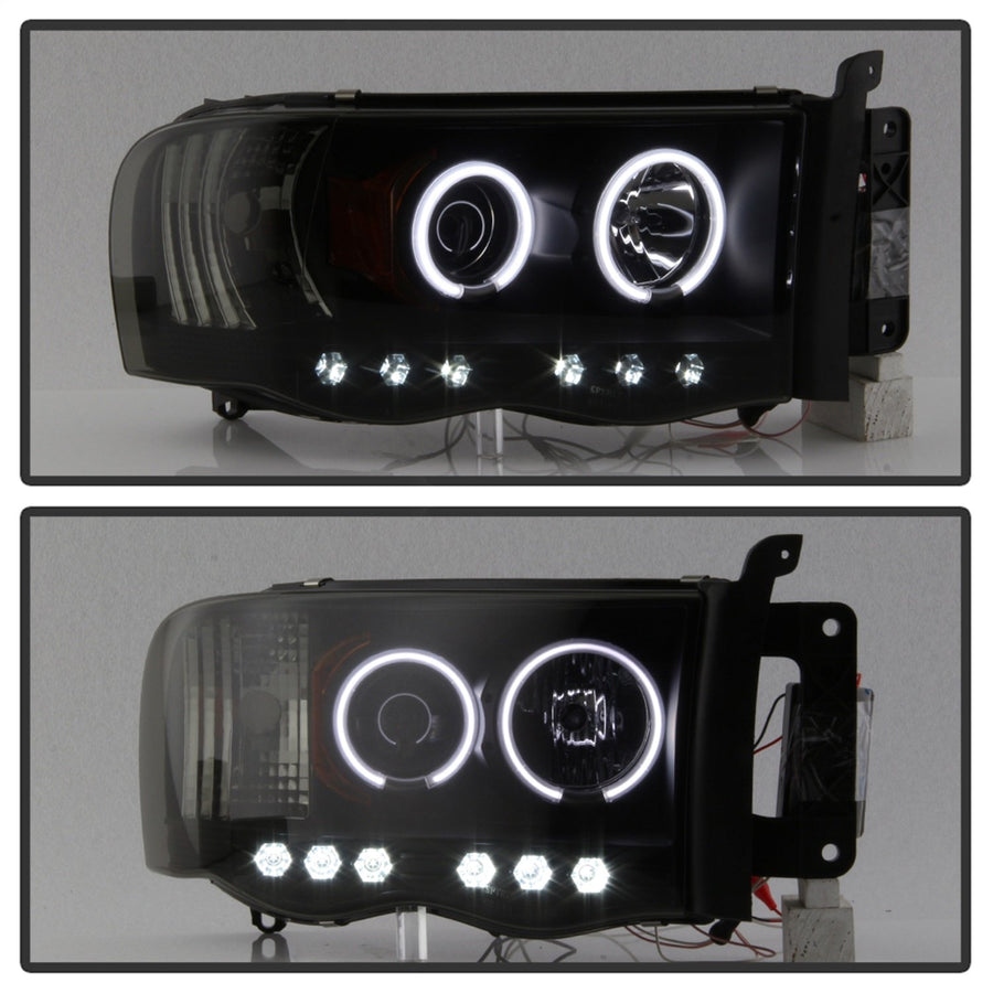 Dodge Ram 1500 02-05 / Ram 2500/3500 03-05 Spyder 5078797 Projector Headlights - CCFL Halo - LED (Replaceable LEDs) - Black Smoke - High H1 (Included) - Low H1 (Included)