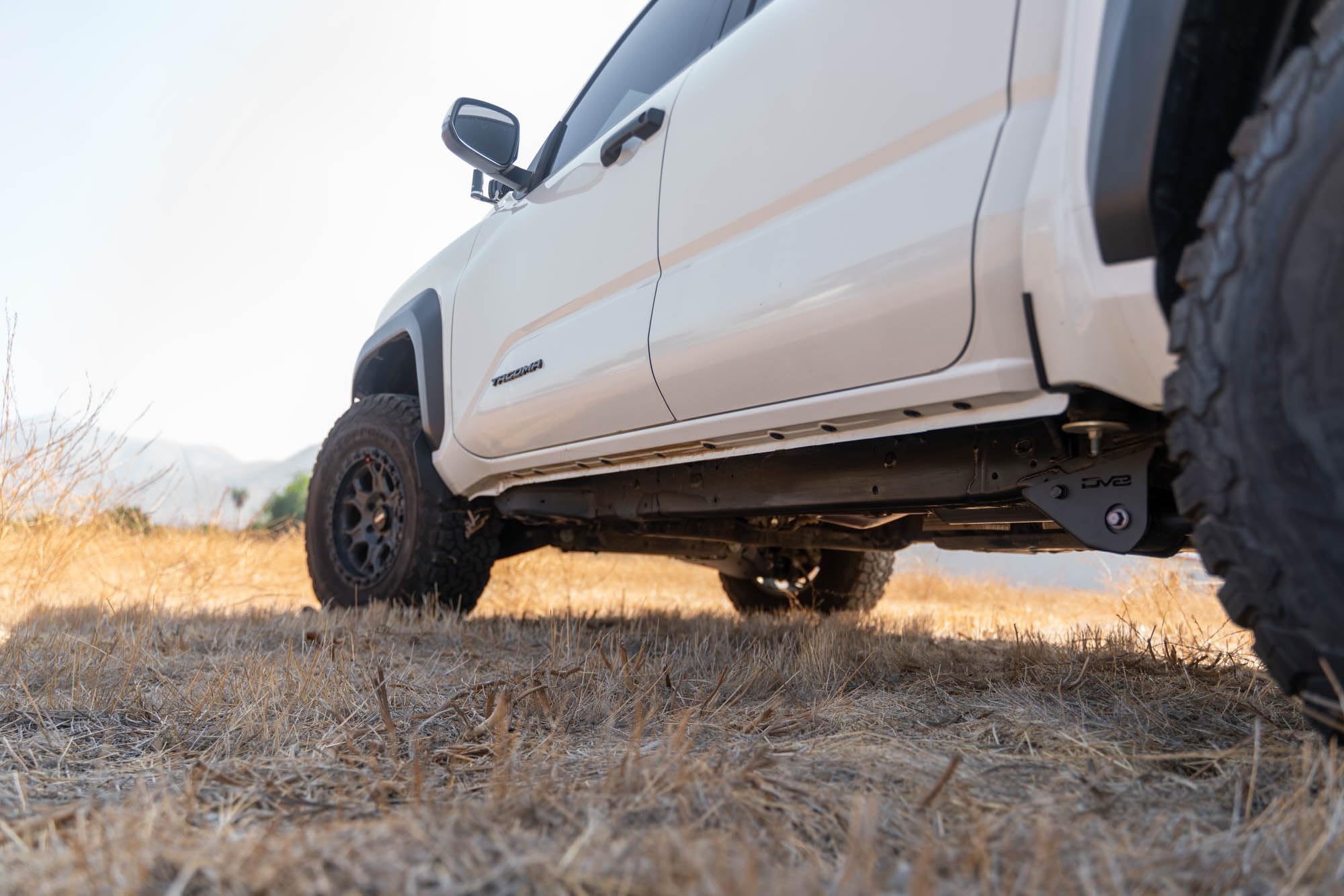 DV8 Offroad Skid Plates for Trailing Arm 2024 Toyota Tacoma | Protects the Vulnerable Trailing Arm Mounts | Helps Prevent Your Truck from Catching on Obstacles | 5mm Steel | Fully Bolt-On Installation