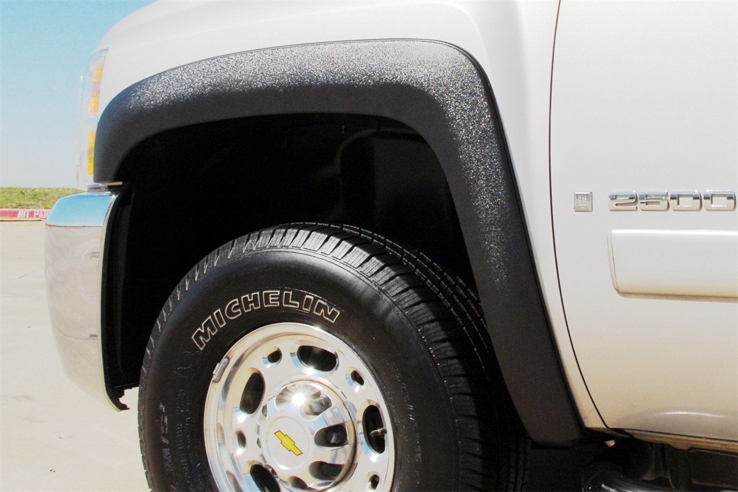 Lund Elite Series SX106TA Black Sport Style Textured Front Fender Flare - 2 Piece