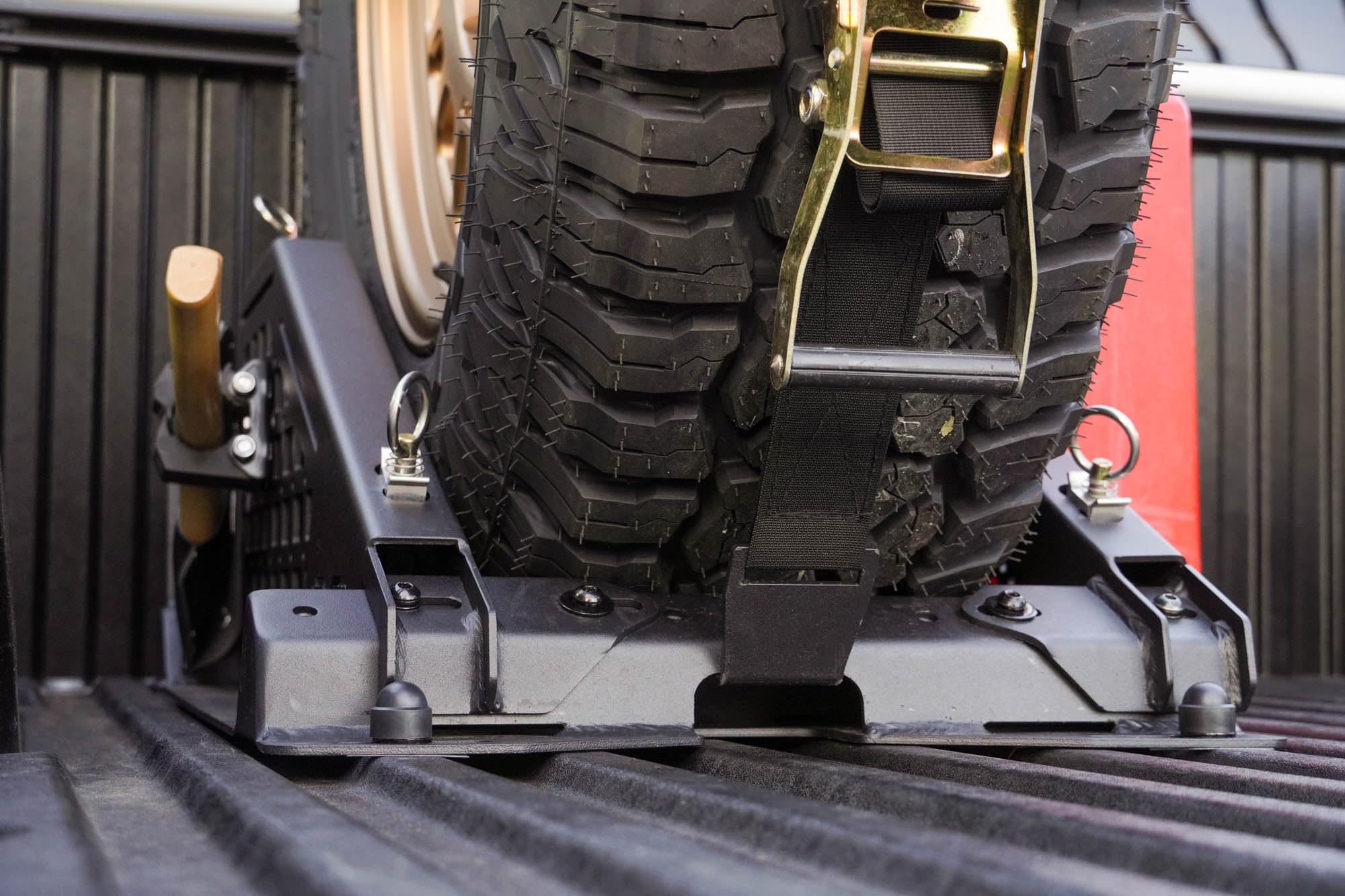 Offroad DV8 Truck Bed Universal Tire Carrier & Accessory Mount | Featured Side Molle Panels for Mounting Gear & Supplies | Adjustable for Carrying Various Sized Tires and Bikes | Powder Coated Finish
