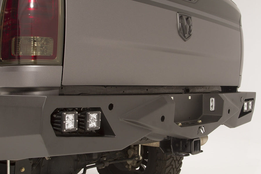 Fab Fours Premium Rear Bumper DR09-E2951-B Uncoated/Paintable w/Sensors [AWSL]