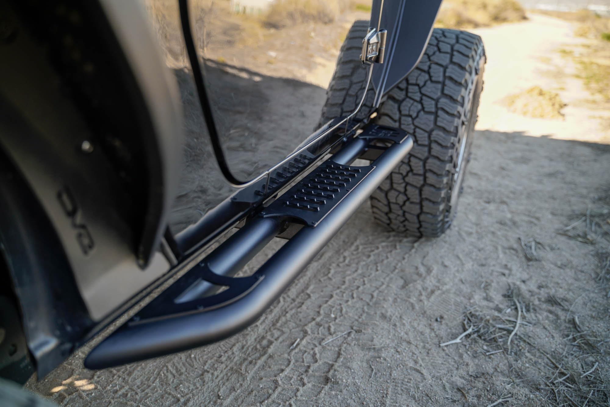 DV8 Offroad OE Plus Side Steps for The Jeep Wrangler JK 2-Door 2007-2018 | Body/Pinch Weld Mounted Side Steps | Anti-Slip Design Provides Excellent Grip for Stepping