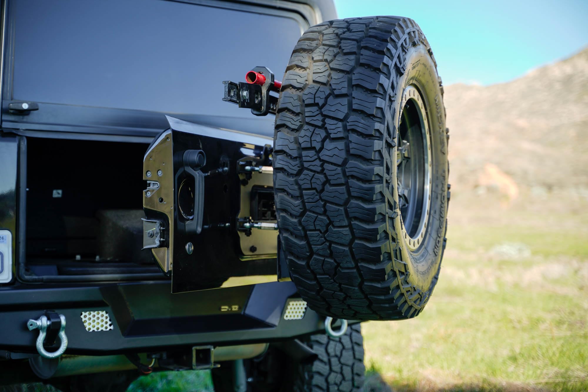 DV8 Offroad Spare Tire Carrier for 2007-2018 Jeep Wrangler JK | MTO Rear Bumper Mounts Only to DV8 Offroad’s MTO Rear Bumper (RBJK-13) | Will Fit Most 38x13.50 Tires