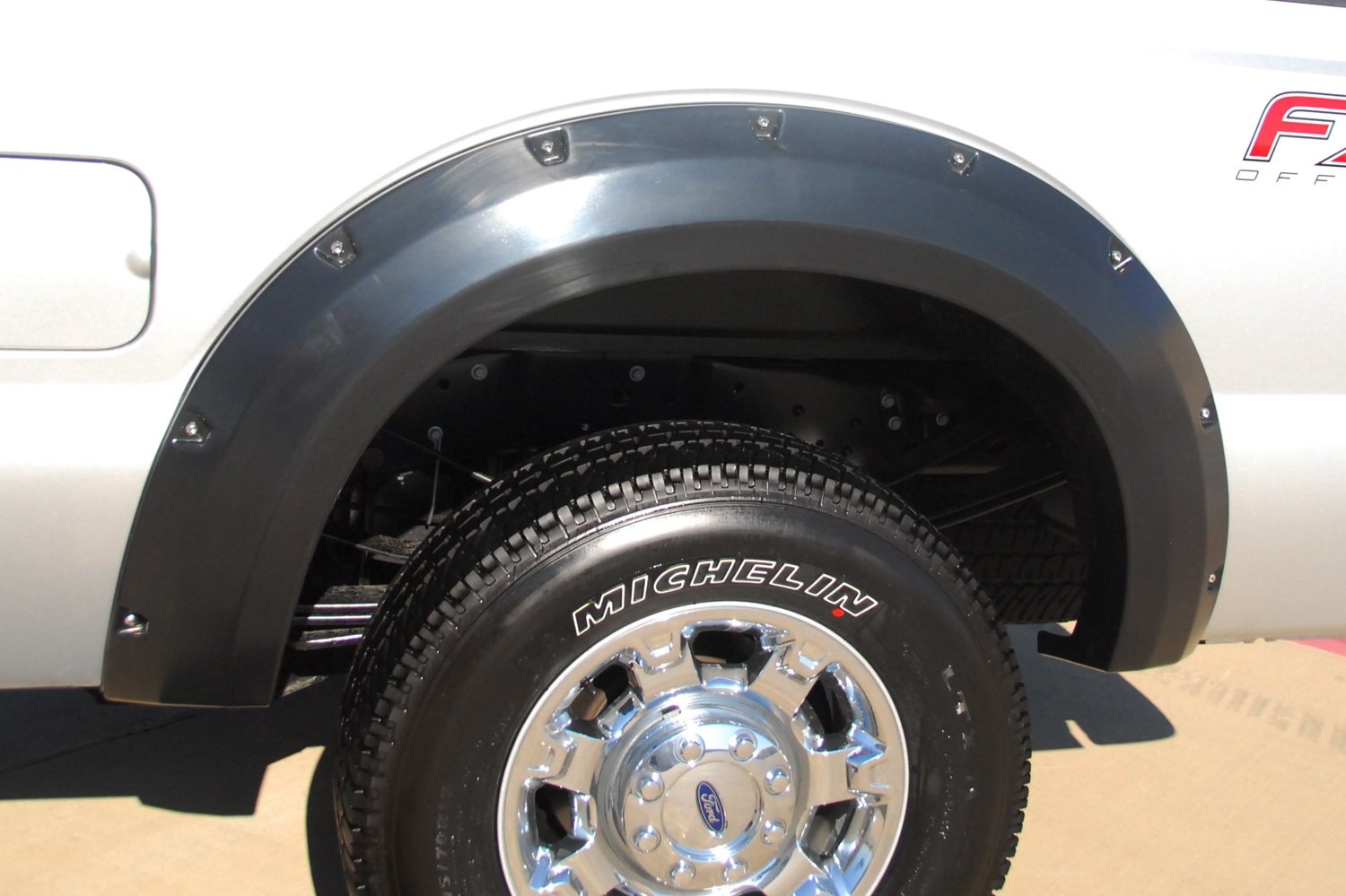 Lund Elite Series RX314TB Black Rivet Style Textured Rear Fender Flare - 2 Piece