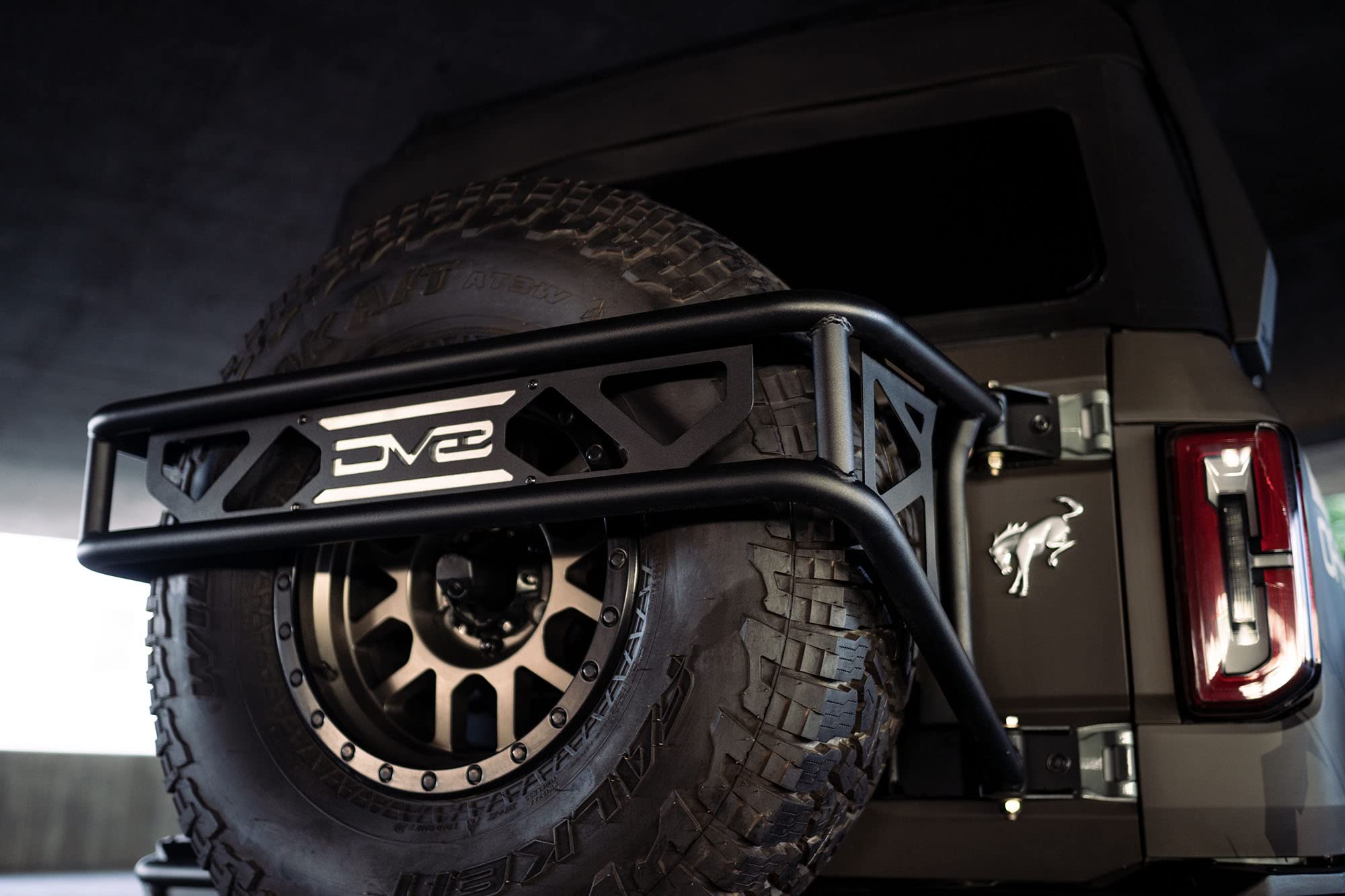 Spare Tire Guard & Accessory Mount DV8 Offroad for 2021+ Ford Bronco | Accepts Up to (Most) 37" Tires | Can Accept Locking Pins | Quick and Easy Install | Paintable Aluminum Panels