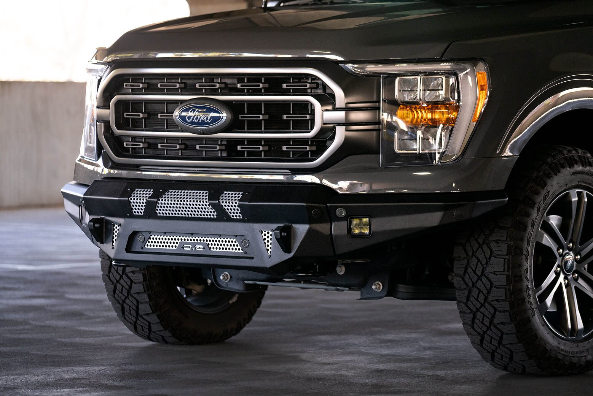 FBFF1-09 | DV8 Offroad | MTO Series Front Bumper for 2021-Current F-150 | 3 Pc Modular Construction | Factory Sensor Compliant | Strategic Airflow Cutouts | LED Light Mounts