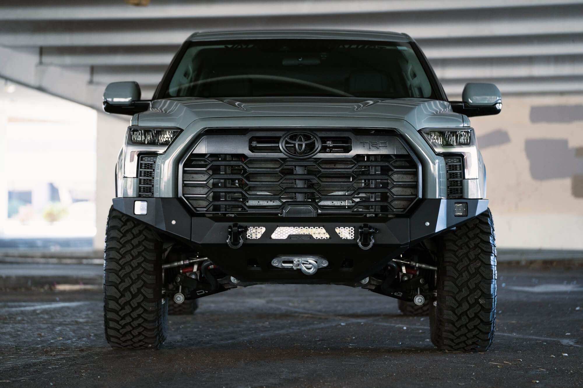 MTO Series DV8 Offroad Winch Front Bumper for 2022-2025 Toyota Tundra | Retains OEM Features | Mount LED Light Bar & Pod Lights | Accepts Multiple Size Winches | Compatible with Stock Skid Plates