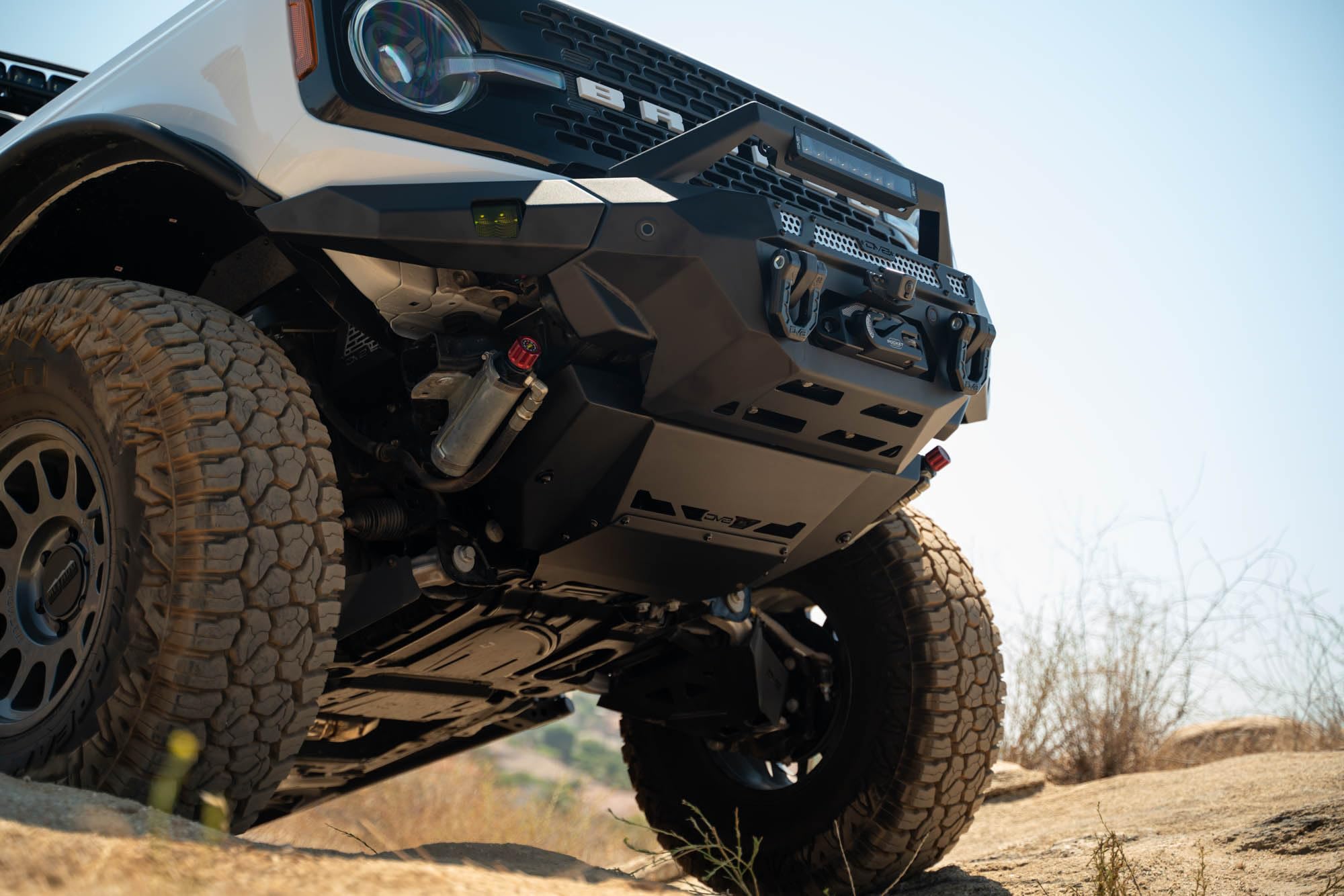 DV8 Offroad Low Pro Skid Plate for 2021-2025 Ford Bronco | Designed for DV8 Front Bumpers | Vented for Improved Airflow | Durable Steel Construction | Bolt-On Installation | Powder Coated Black