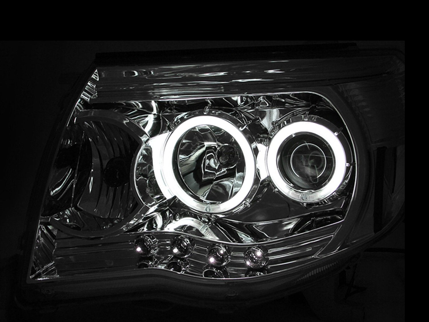 Chrome Clear AnzoUSA Projector Halo Headlight for Toyota Tacoma - (Sold in Pairs)