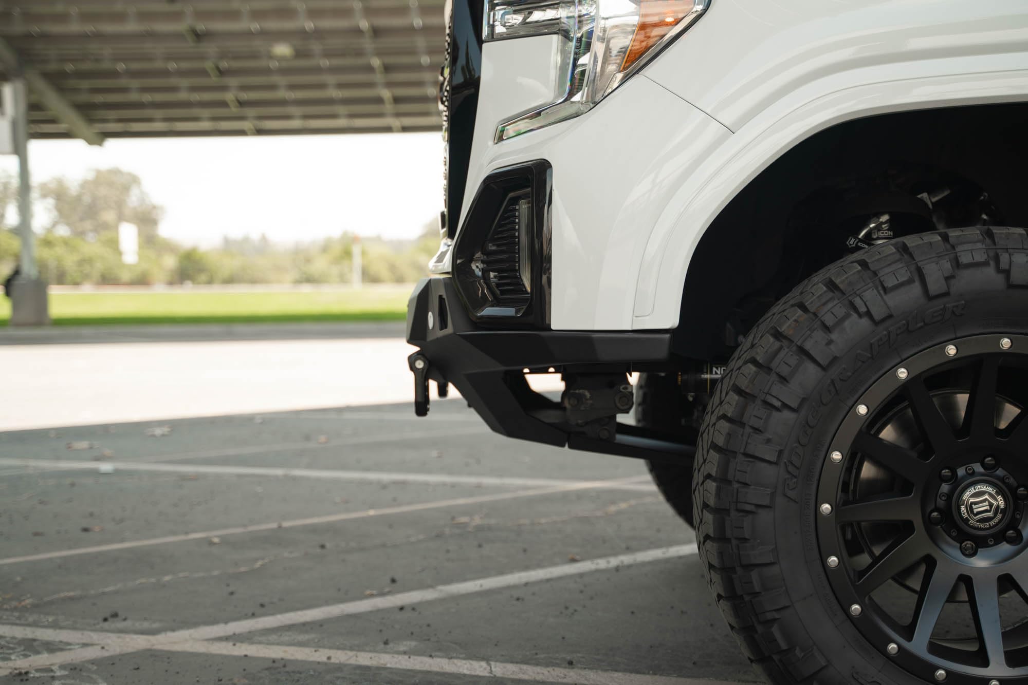 Front Bumper DV8 Spec Series for 2019-2021 GMC Sierra 1500 | Steel Front Skid Plate | One 20" Light Bar Mount | Two 3" Pod Light Mounts | Heavy-Duty Winch Mount | 2 D-Ring Mounts | Powder Coated Black