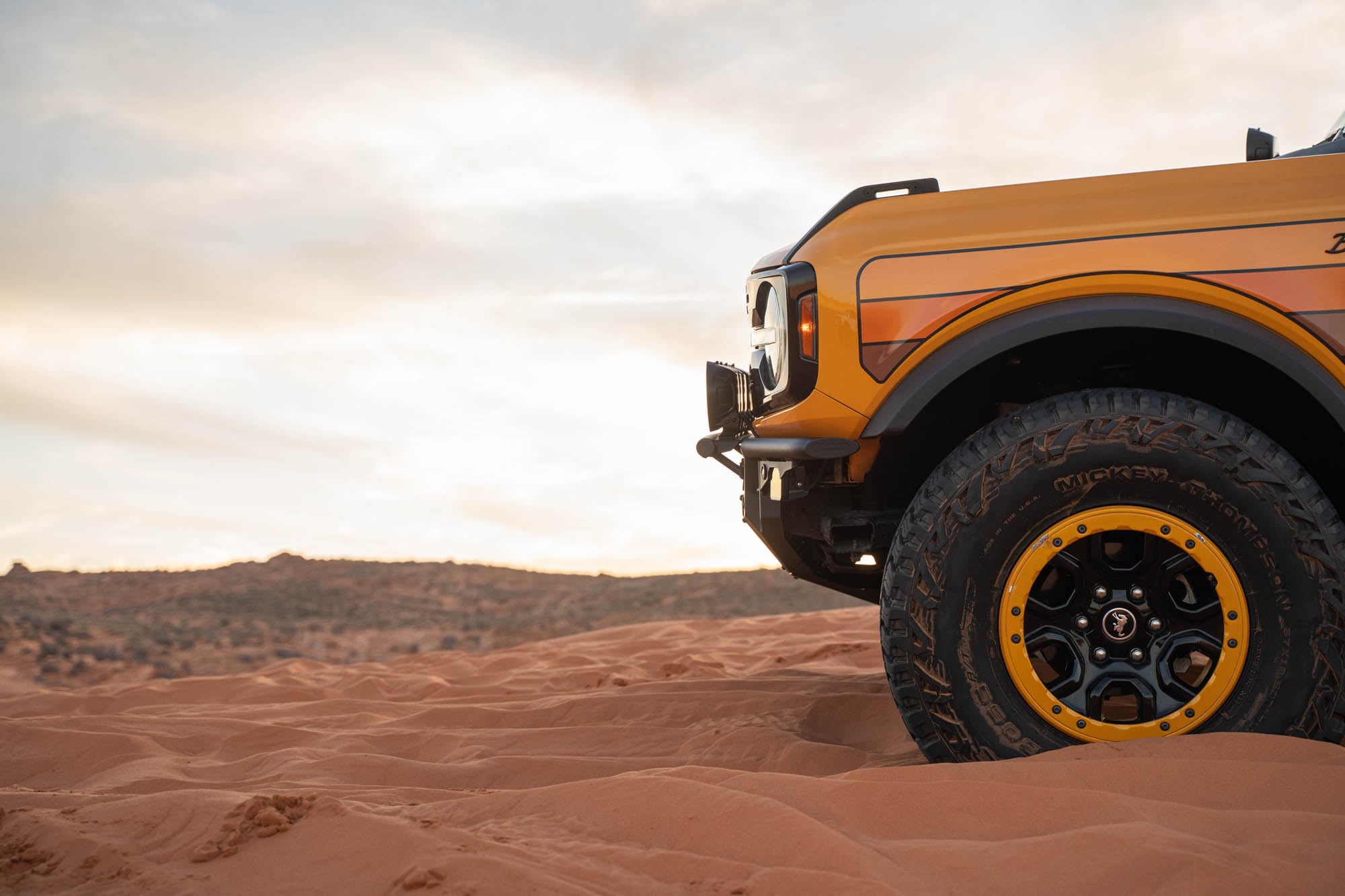 Front Bumper DV8 Offroad Tube Series for 2021-2025 Ford Bronco | Ultra High-Clearance Design | Center Light Mount | Prerunner Style Bolt-On Light Hoop | Recovery Points | Front Skid Plate | Steel